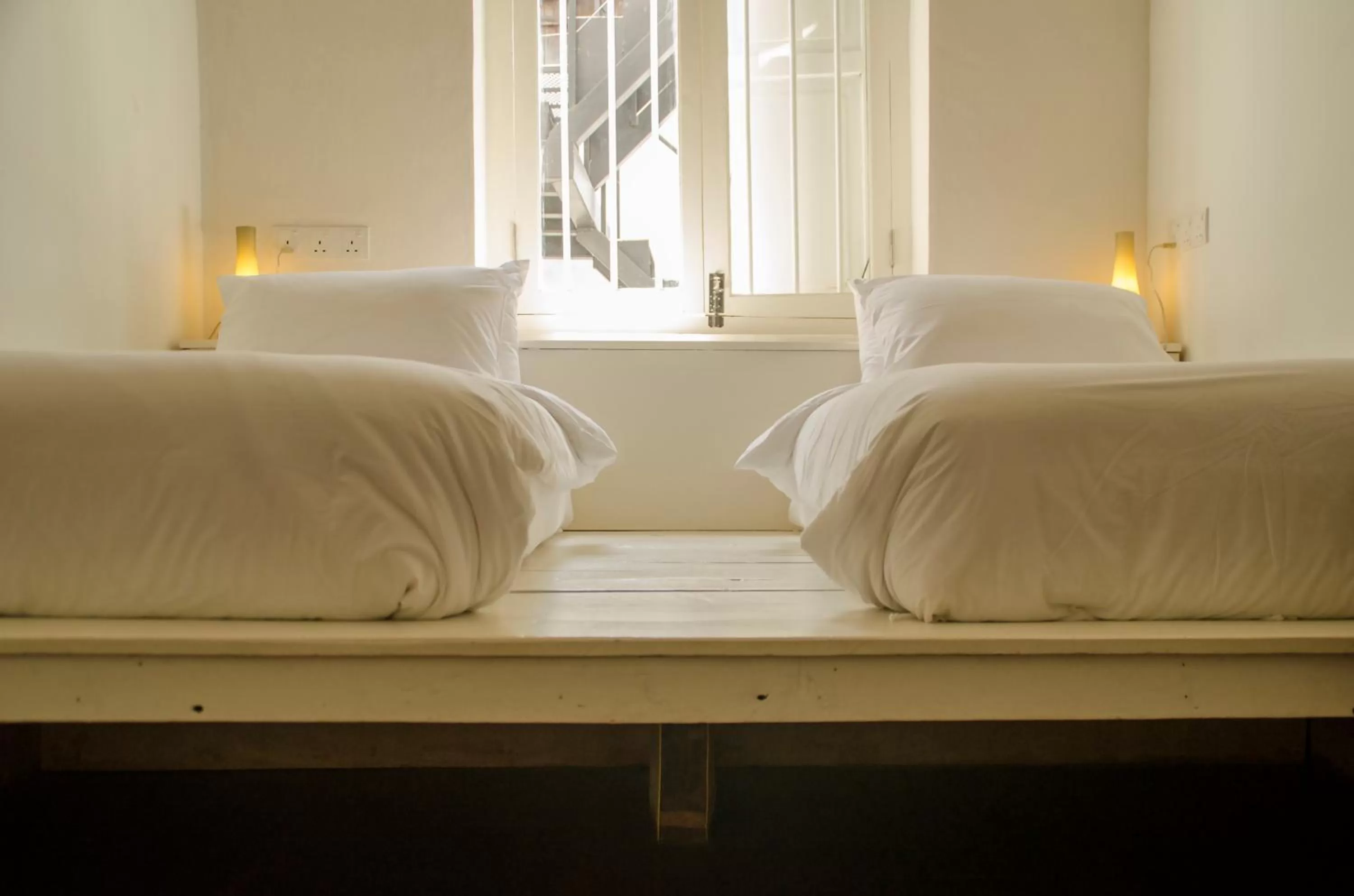 Bed in Ren I Tang Heritage Inn