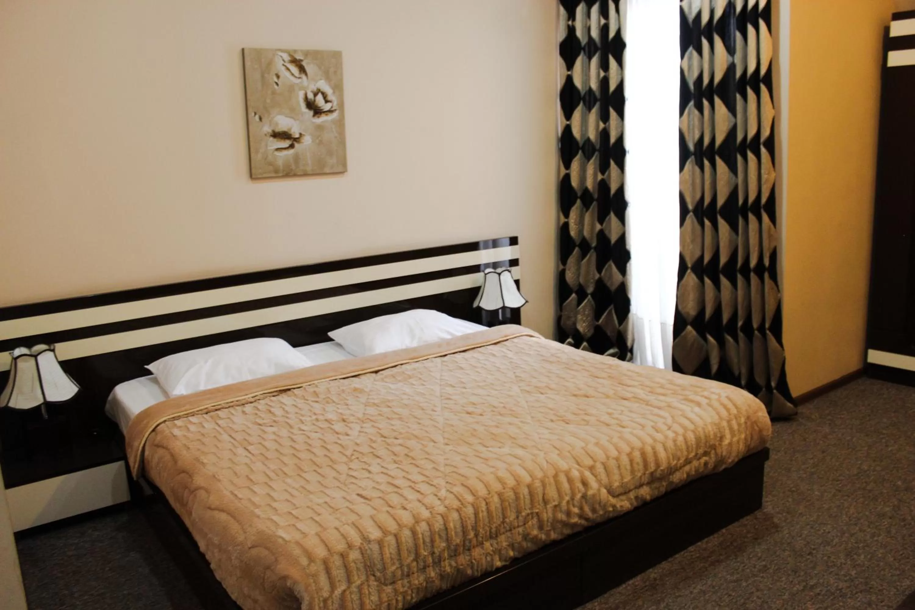 Bed in Hotel Diplomat