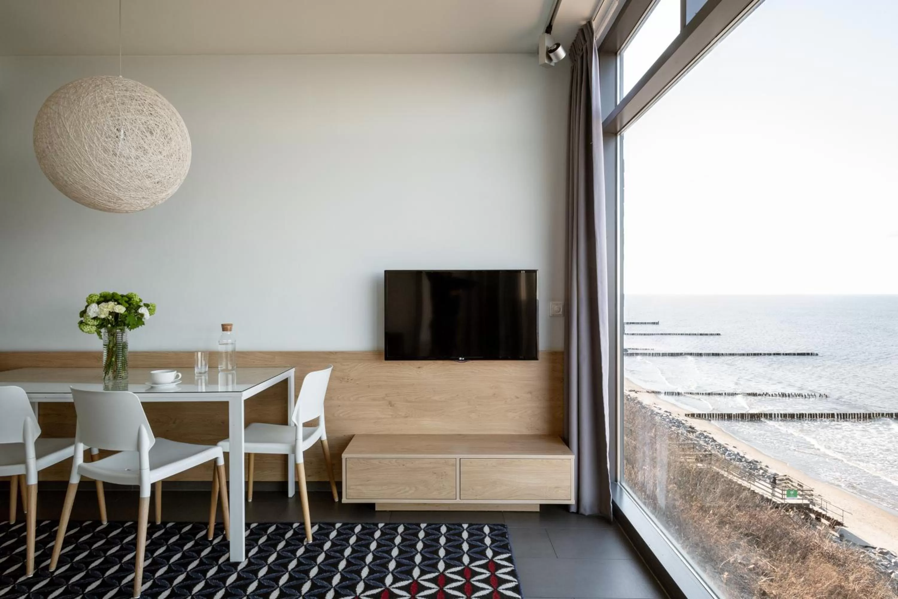 Living room in Boulevard Ustronie Morskie by Zdrojowa