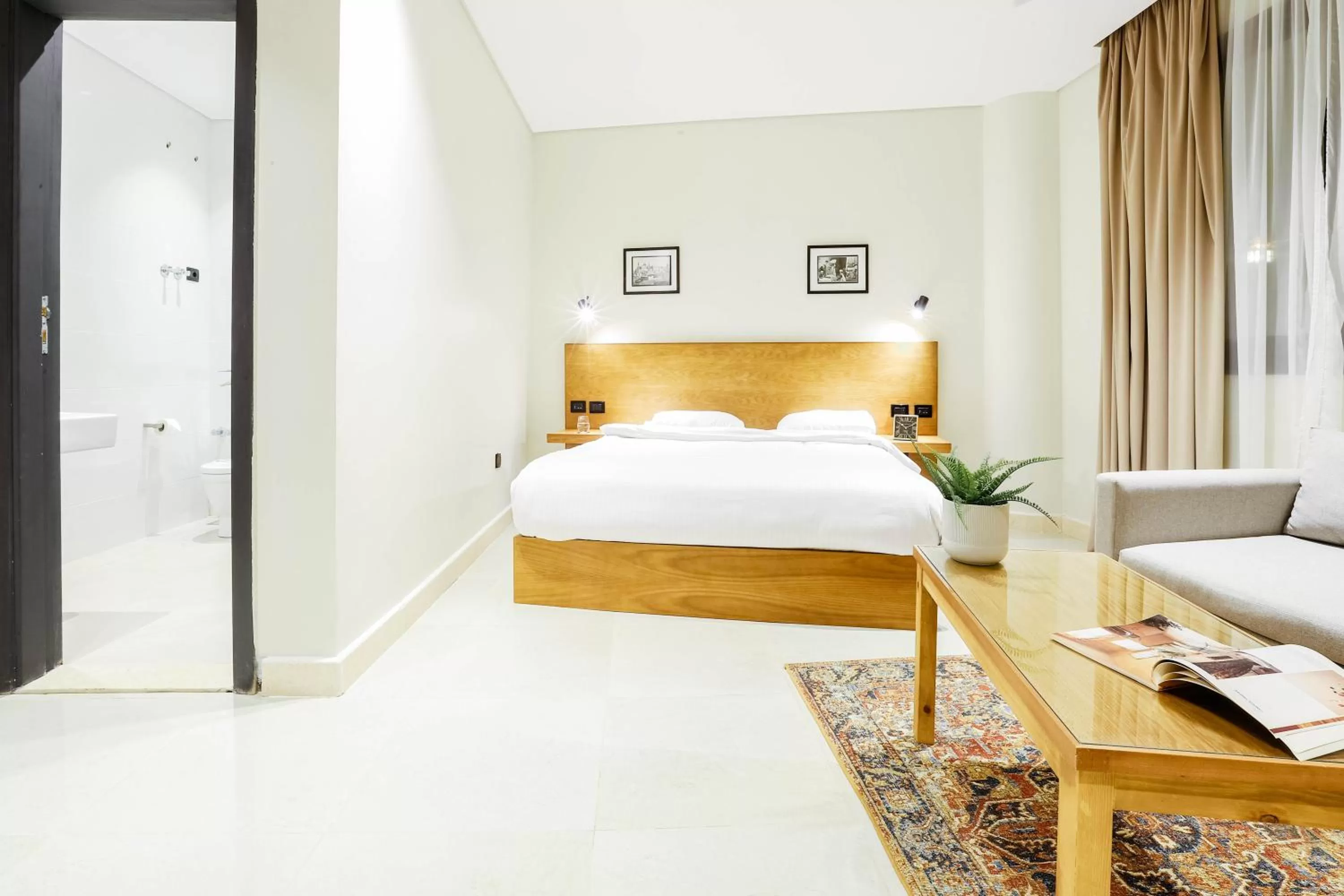 Photo of the whole room, Bed in NewCity Hotel & Suites