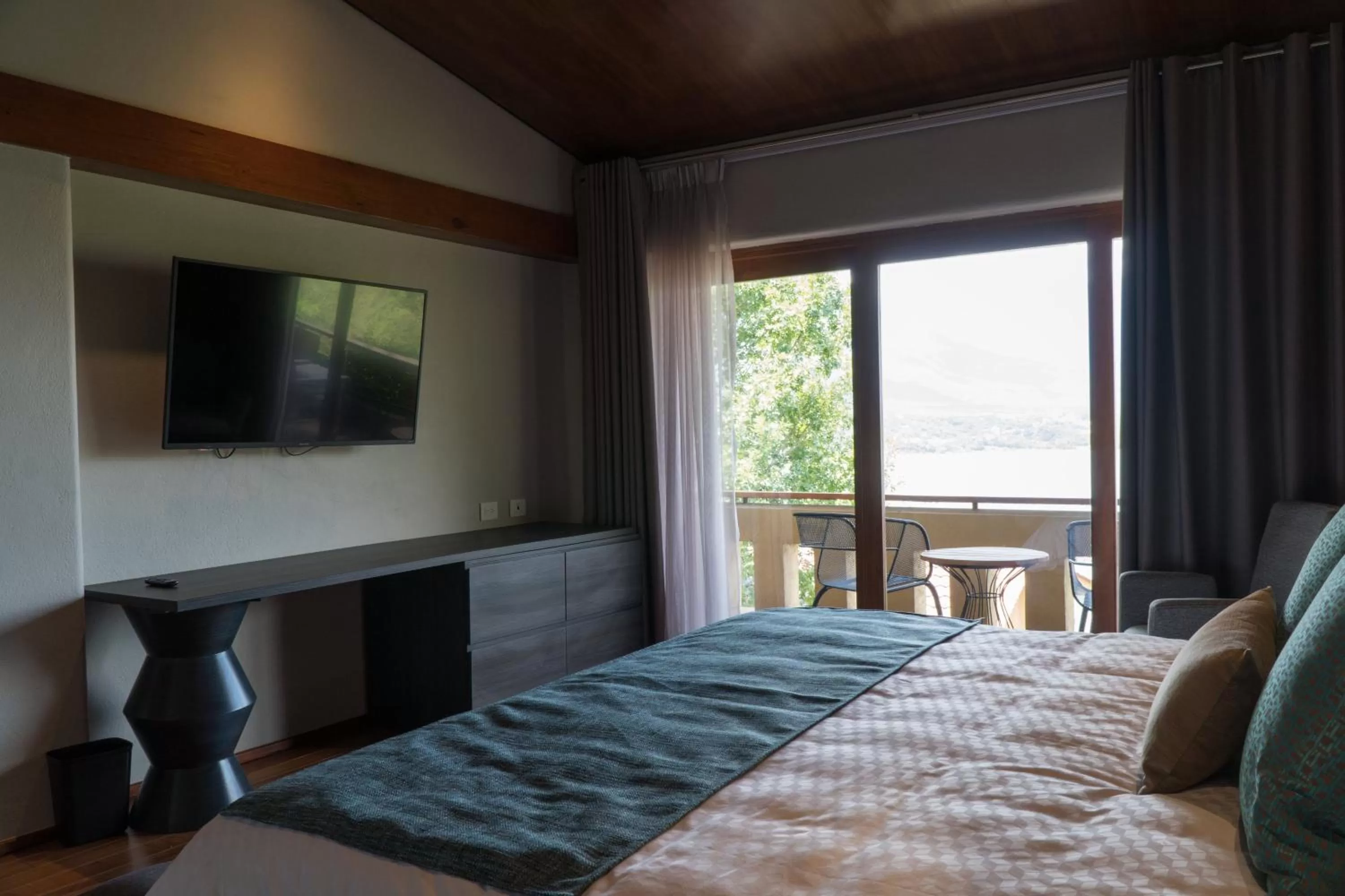 Photo of the whole room, Bed in Gamma Monterrey Rincon de Santiago