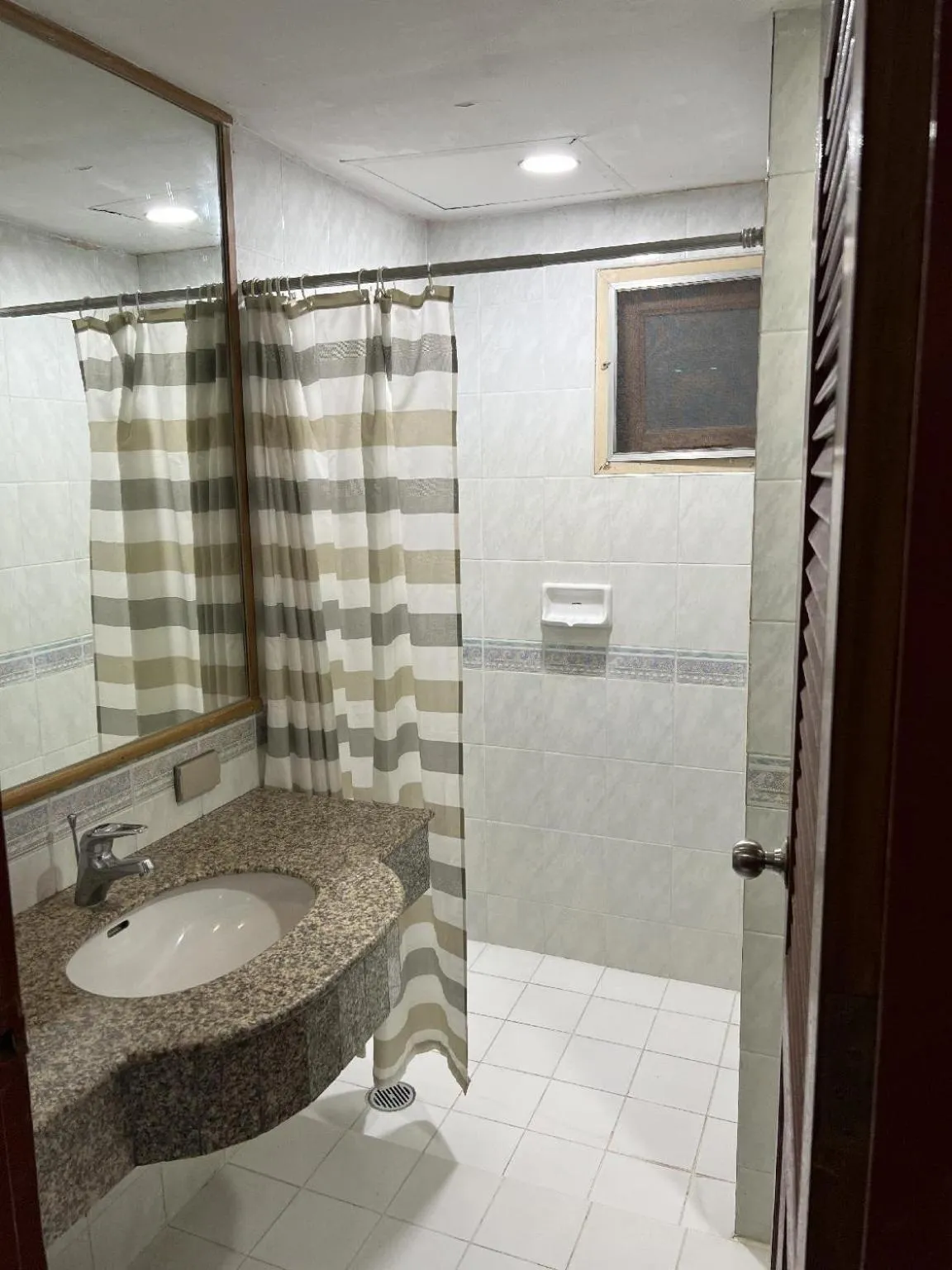 Shower in Mall Suites Hotel