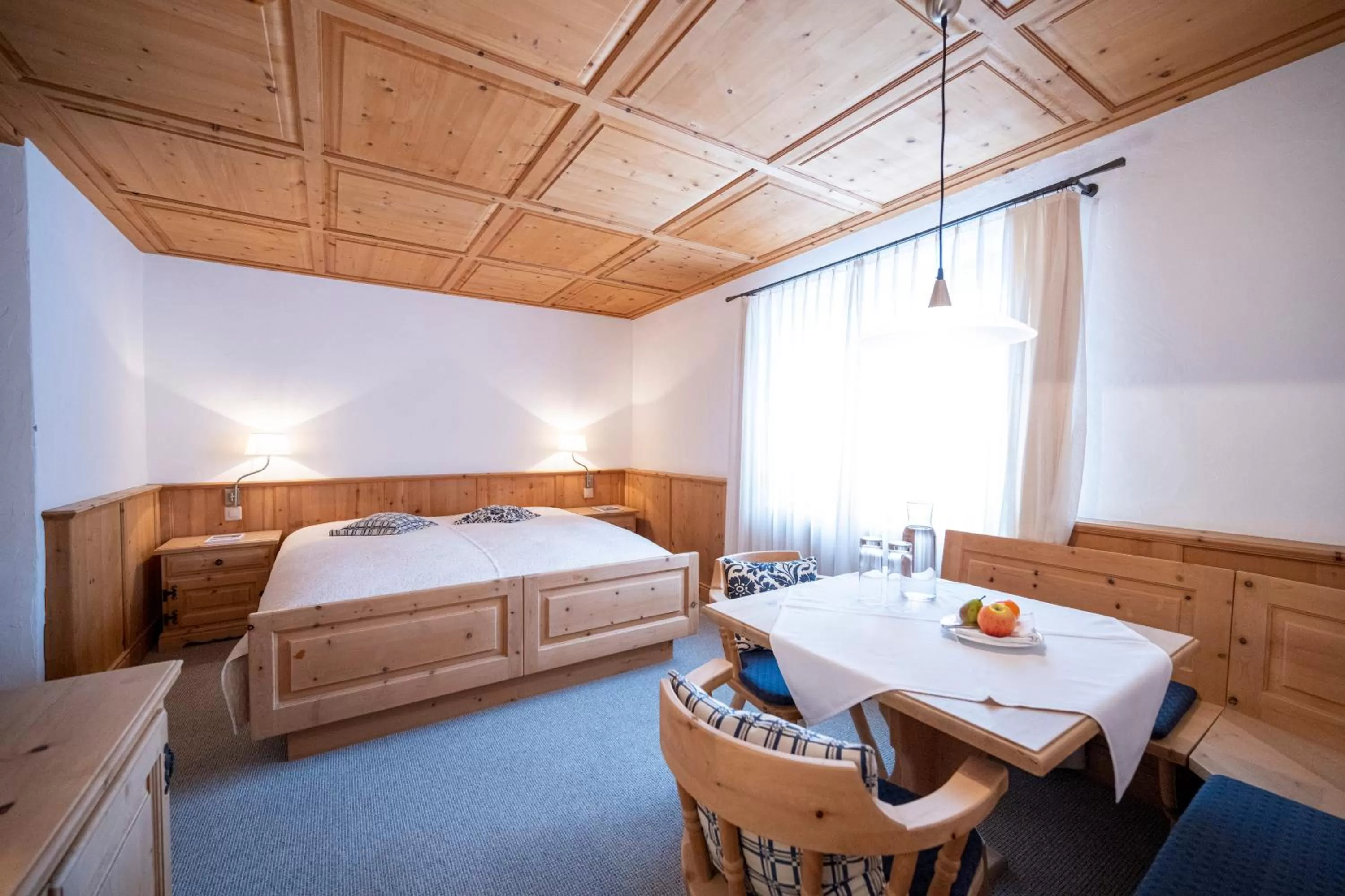 Bed in Hotel Engiadina