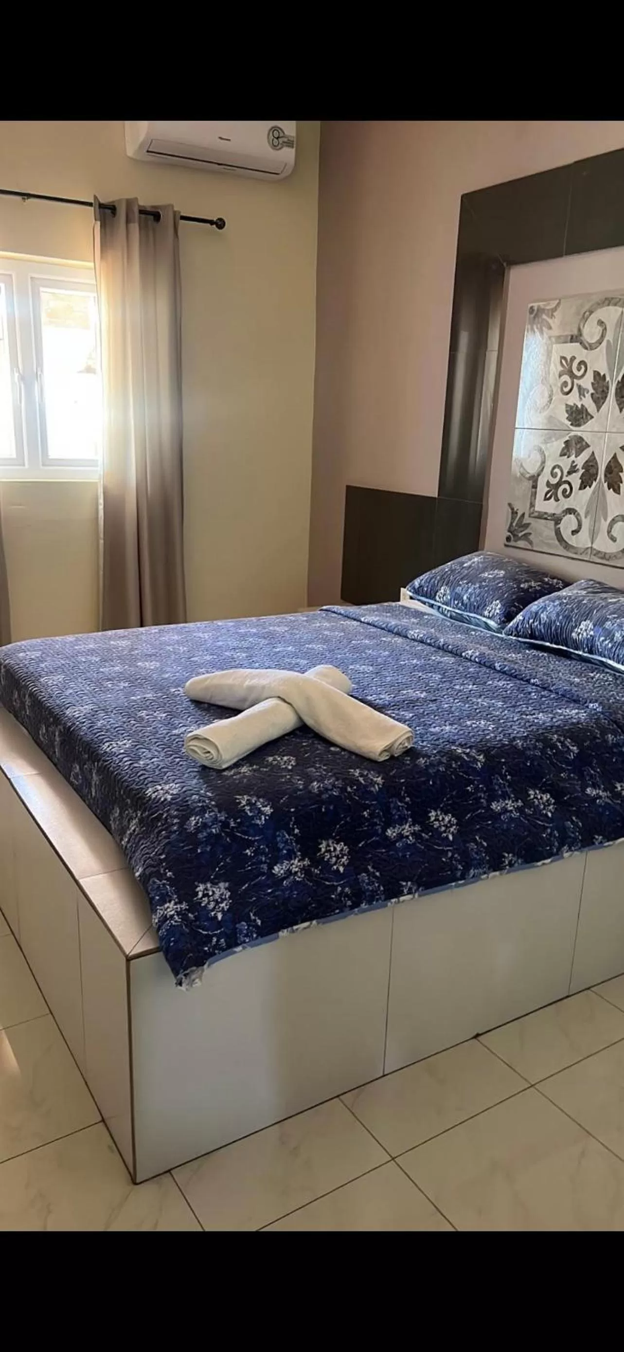 Bed in Curasita colour Appartments