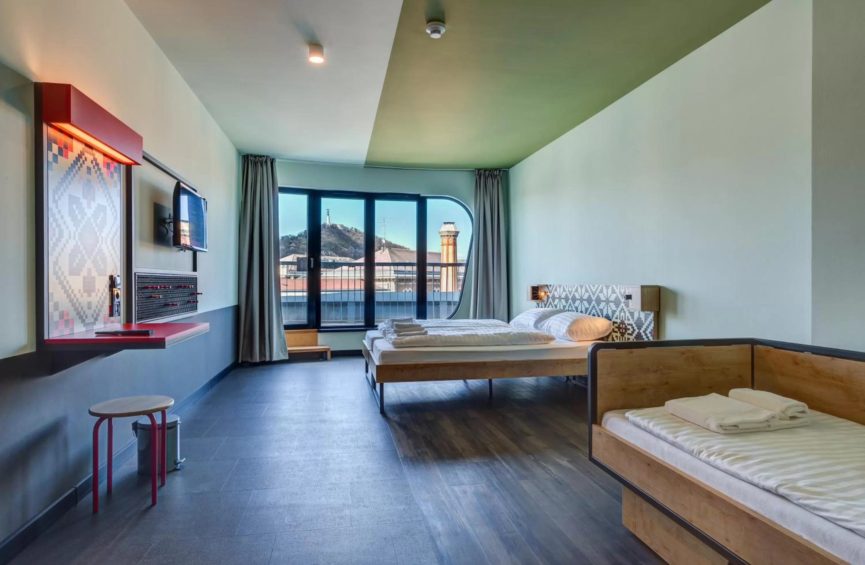 Photo of the whole room, Bed in MEININGER Budapest Great Market Hall