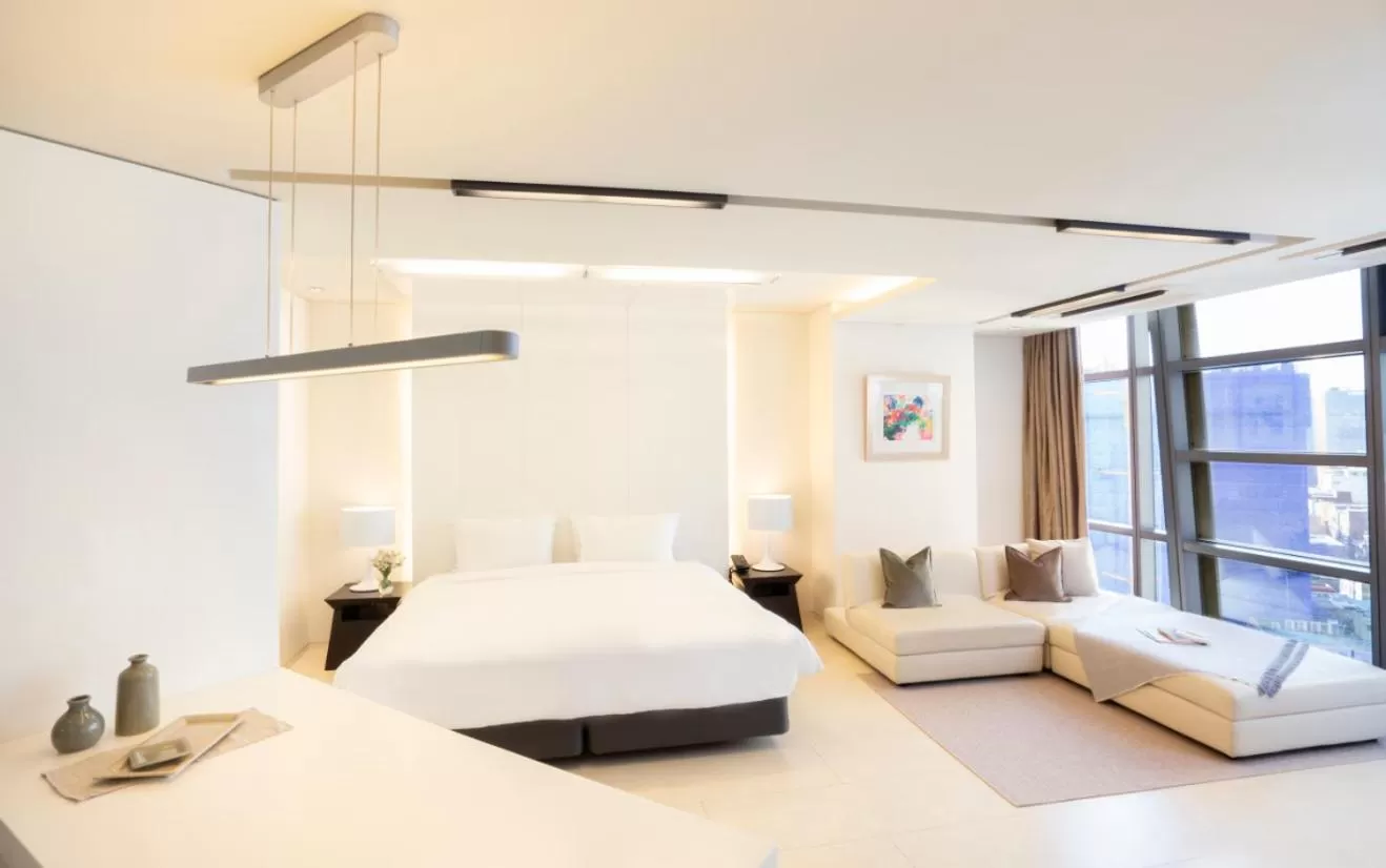 Bed in The Classic 500 Pentaz Executive Residence