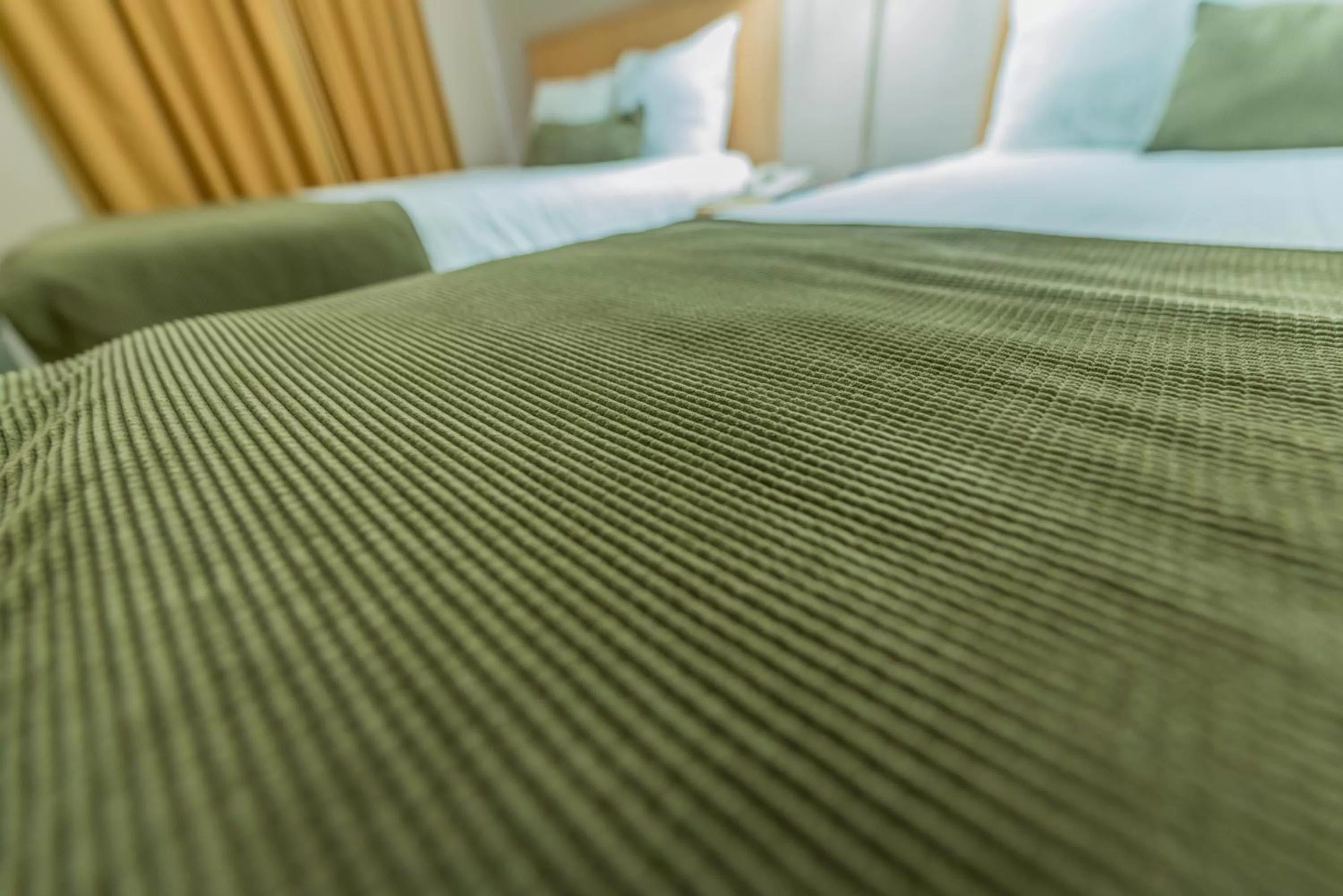 Bed in Howard Johnson by Wyndham Downtown Kamloops