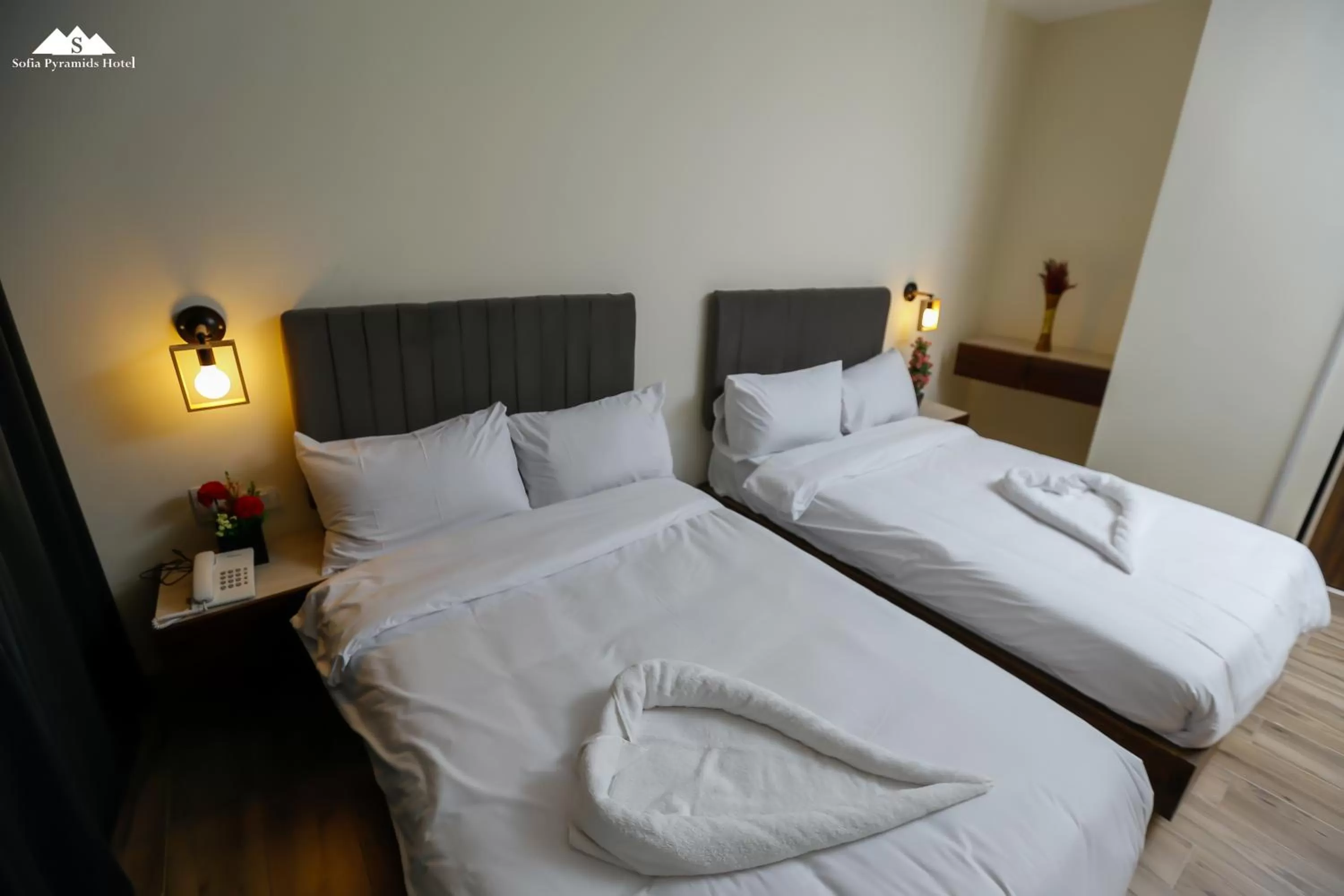 Bed in Sofia Pyramids Hotel