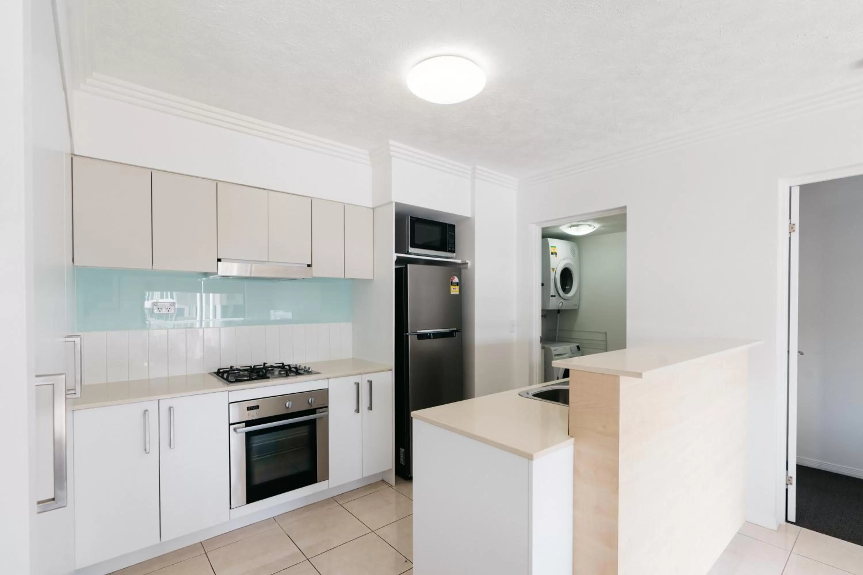 Kitchen or kitchenette in Gabba Central Apartments