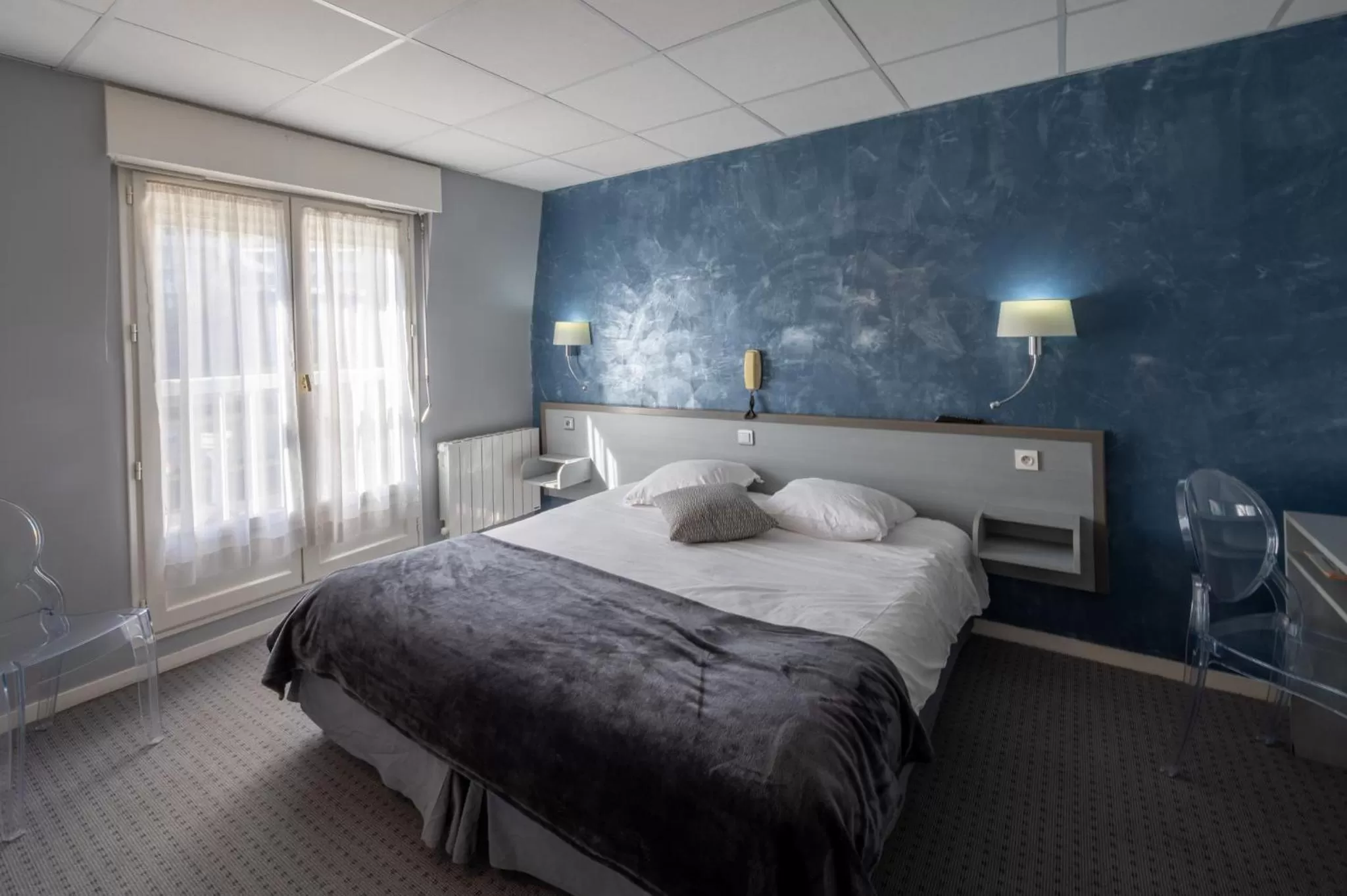 Bed in Hôtel du Soleil Levant