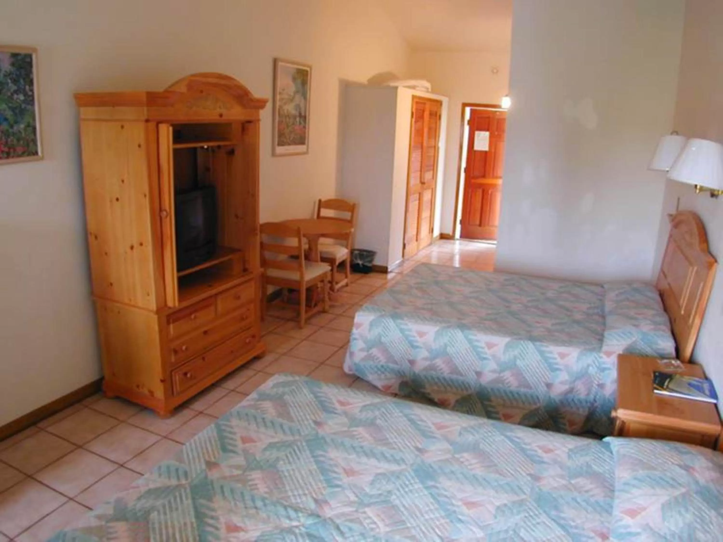 Bed in Orange Hill Beach Inn