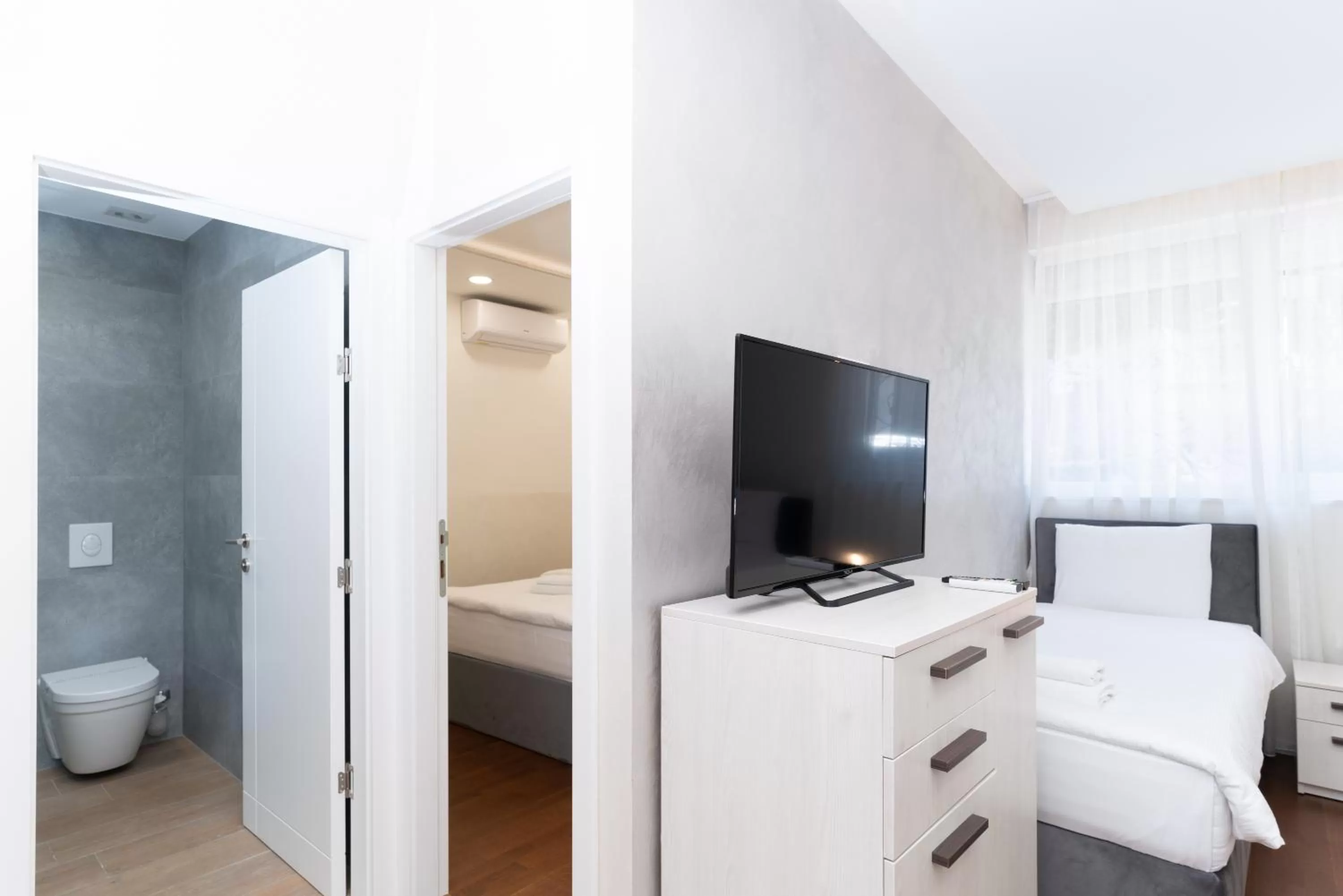 Bathroom, Bed in Ornament Hotel and Apartments