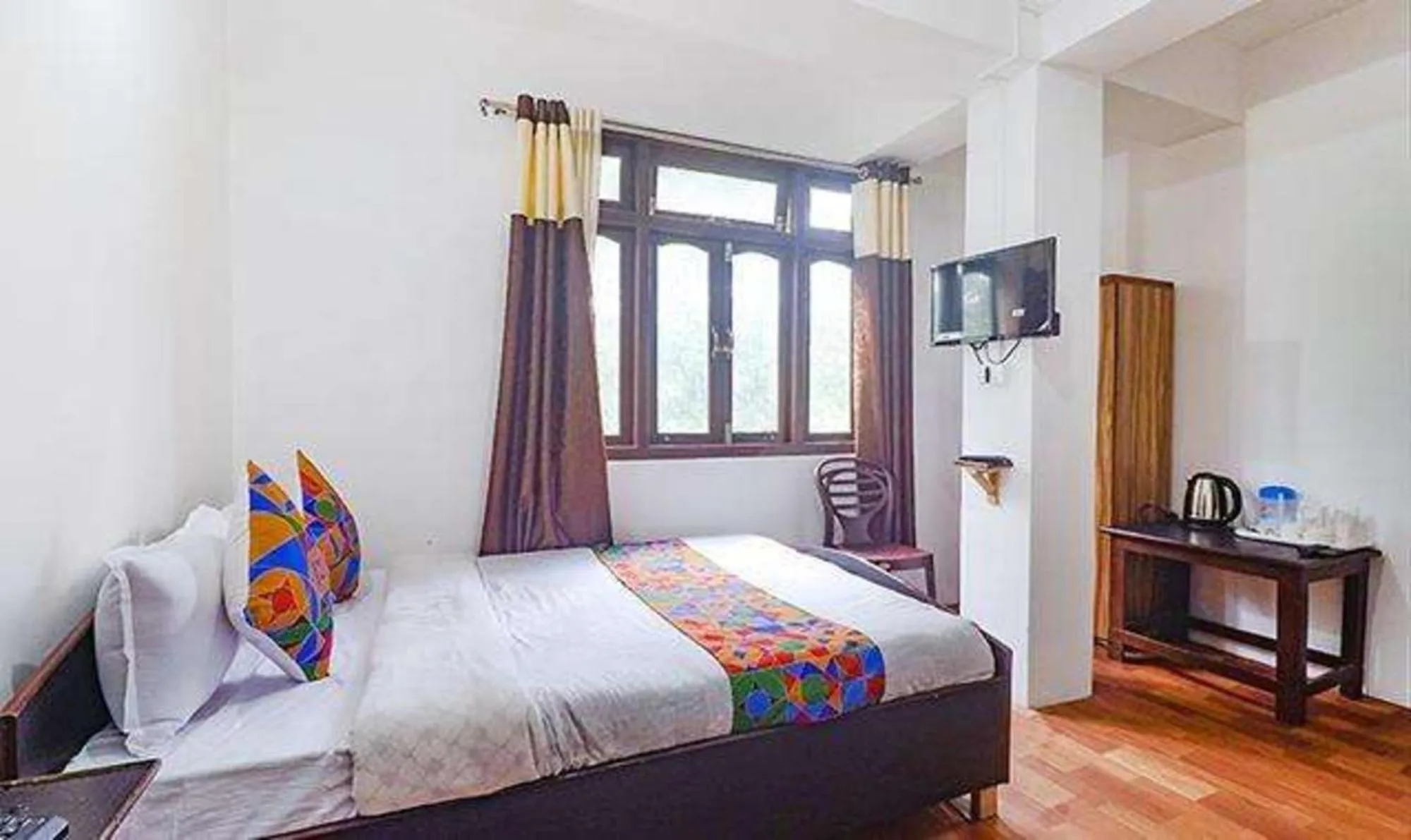 Bed in FabExpress Laxmi Niwas