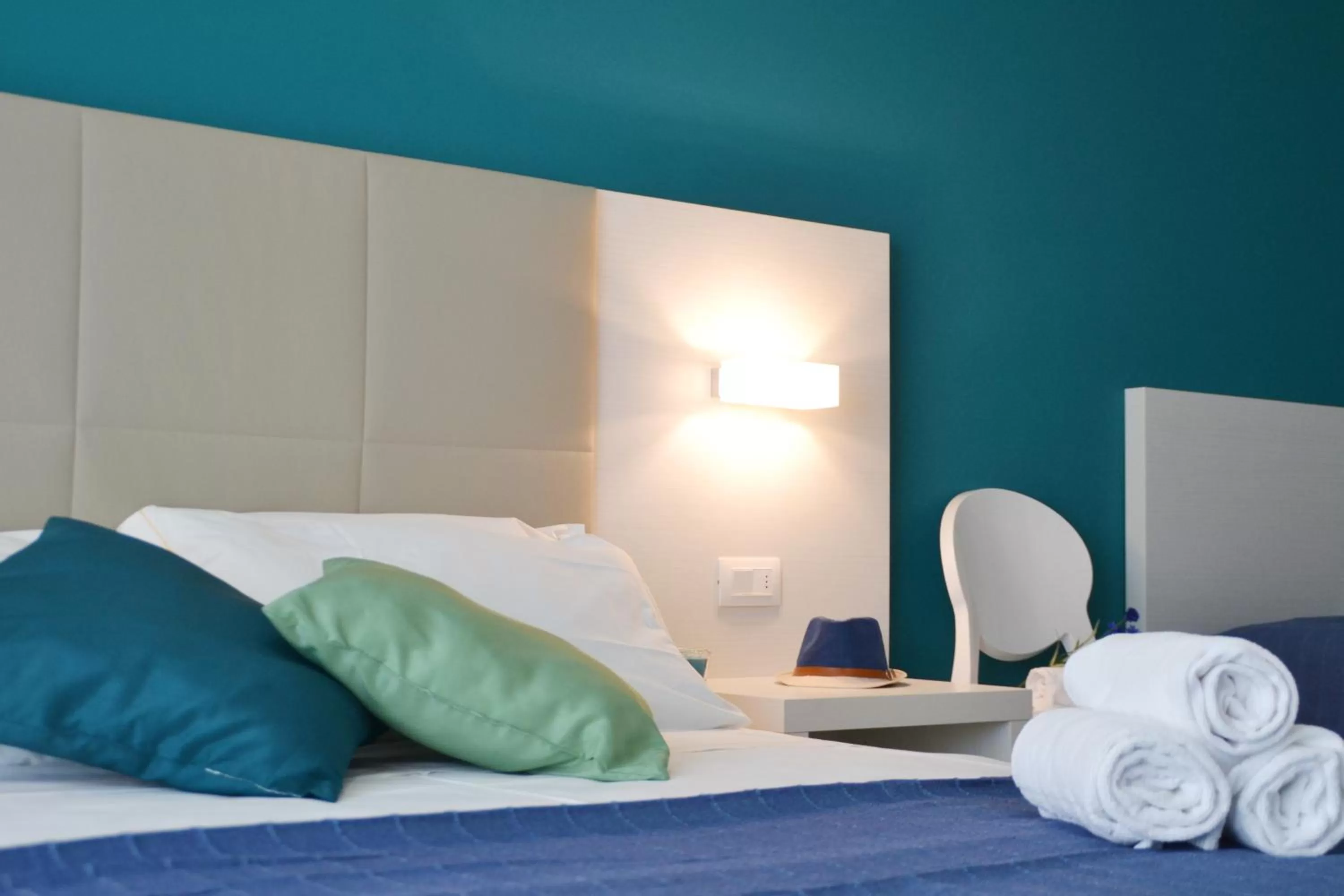 Bed in Elite Boutique Hotel