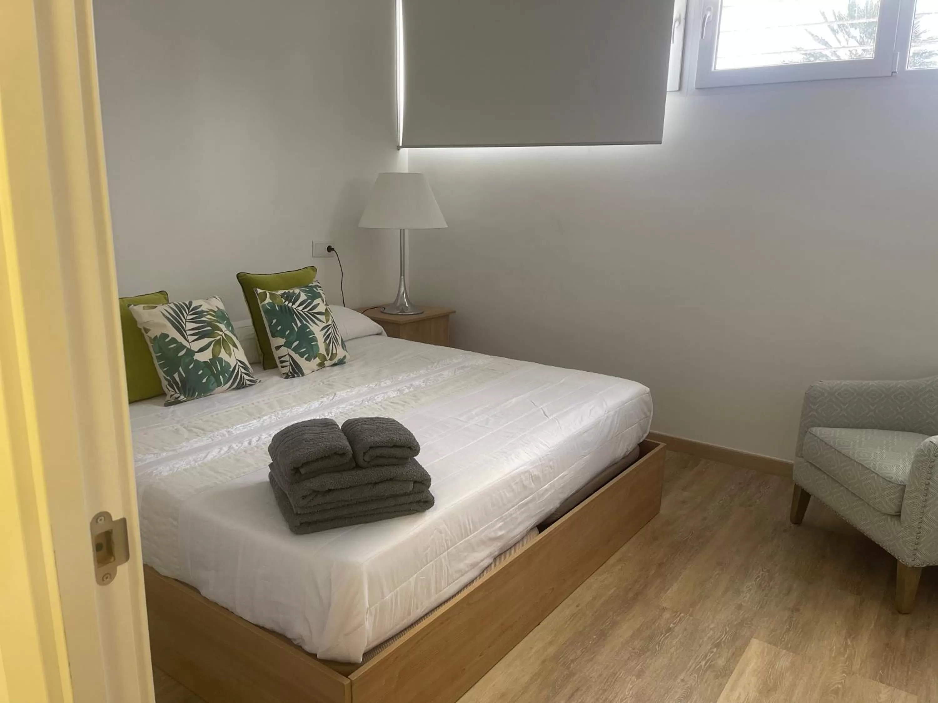 Bed in HOTEL apartamentos SEVEN ROOMS