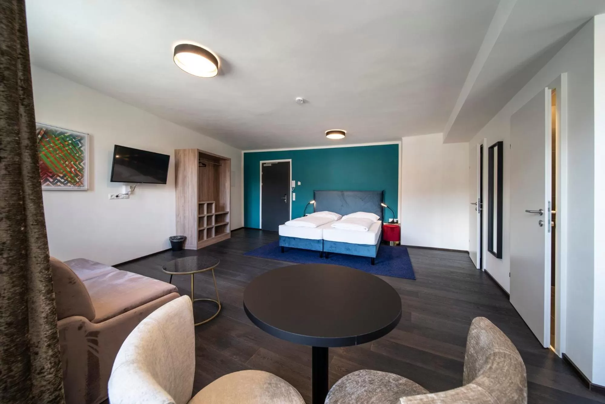 Photo of the whole room, Bed in Blackhome Innsbruck Boutique I contactless check-in