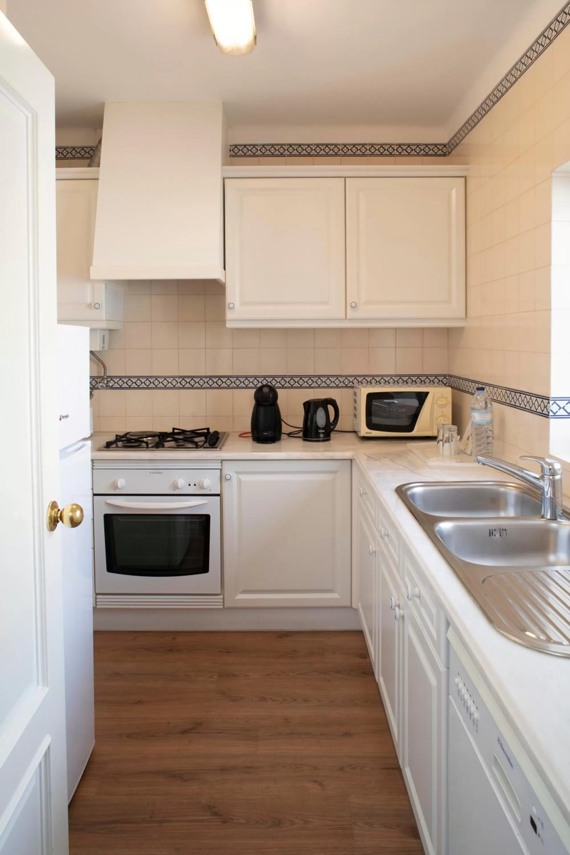 Kitchen or kitchenette in Vila Bicuda Resort