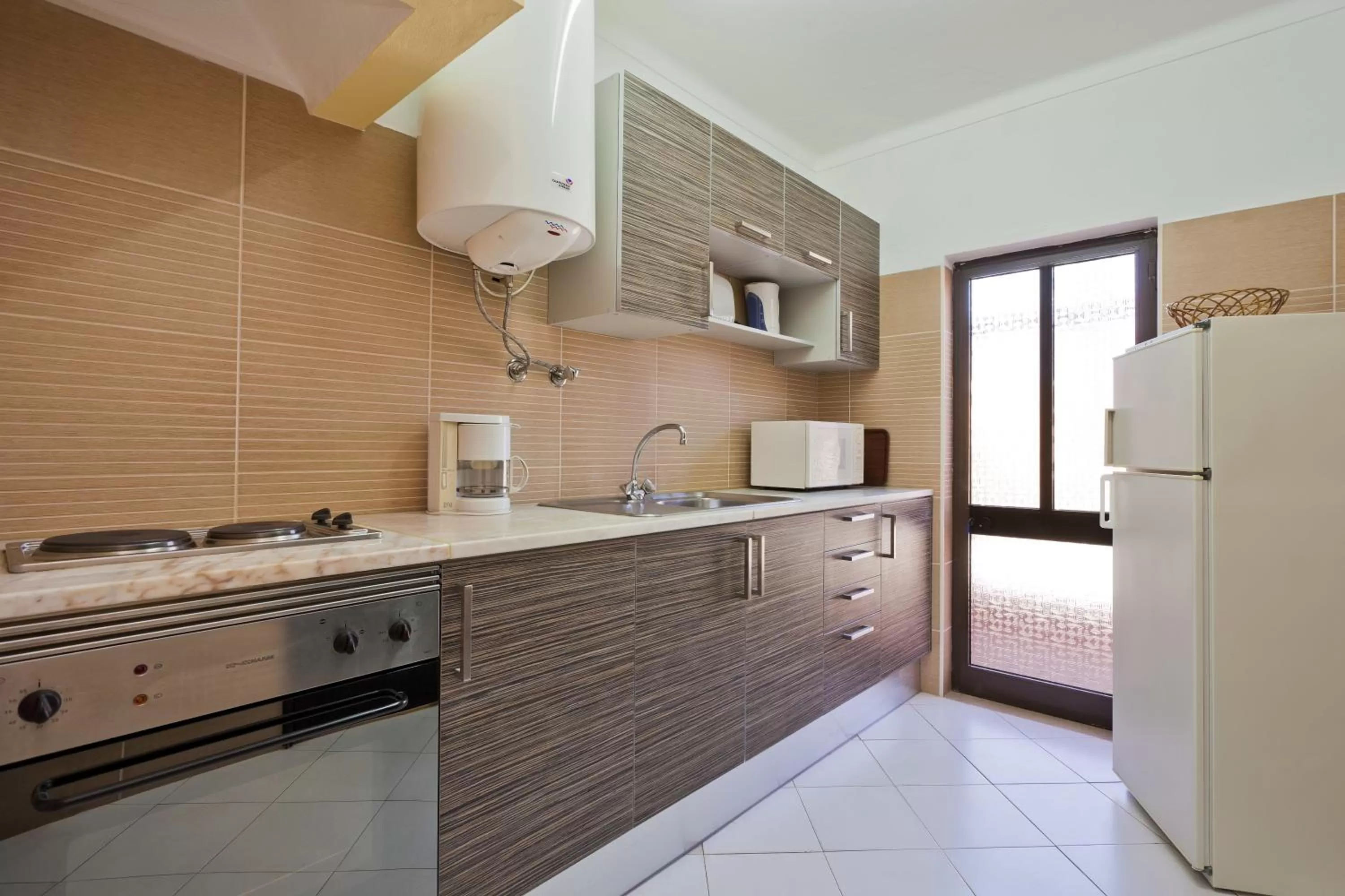 Kitchen or kitchenette in Colina Village