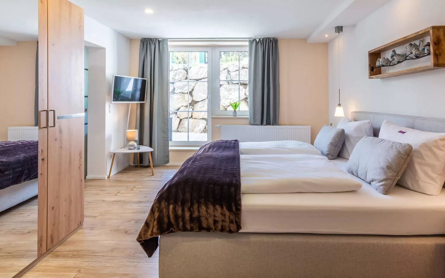 Bed in Das Maximilian - Feines Landhotel am Schliersee