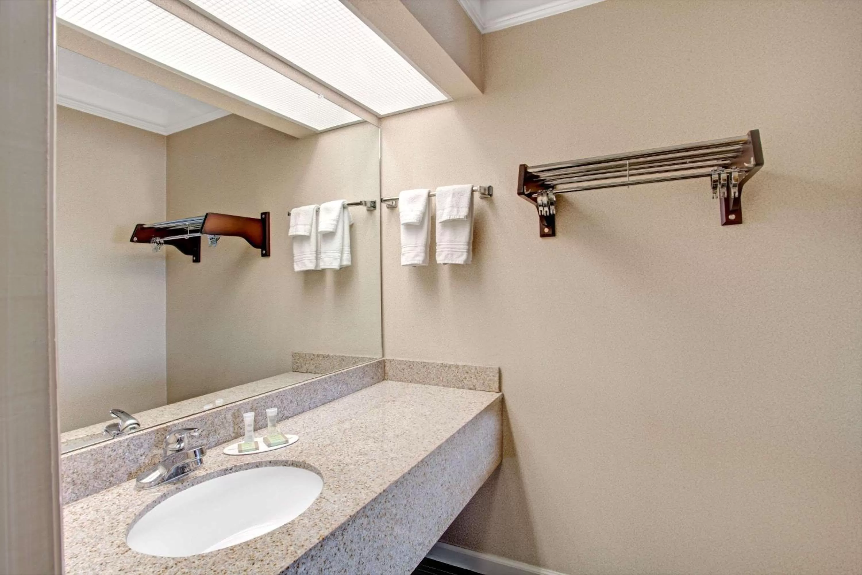 Bathroom in Super 8 by Wyndham Knoxville East