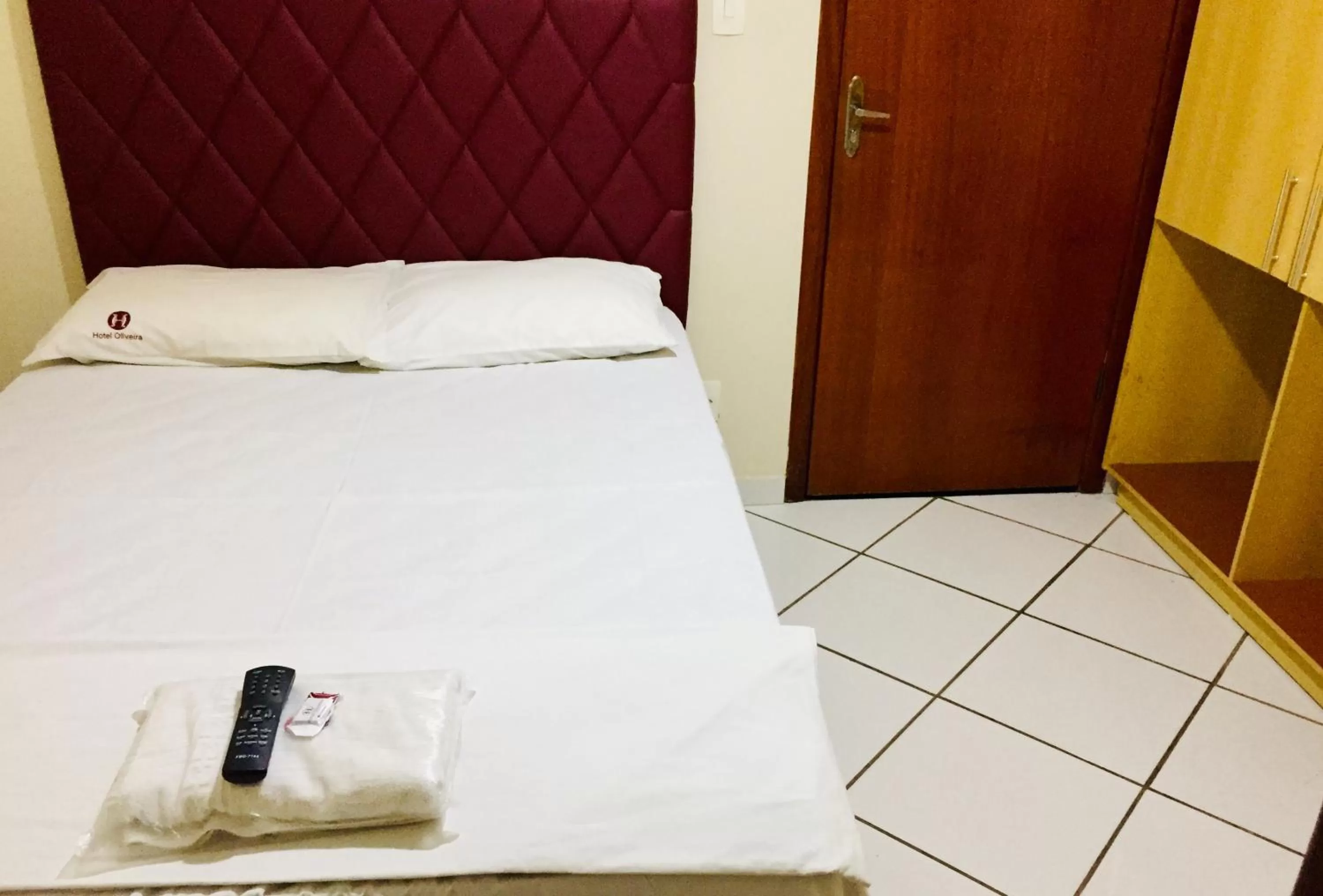 Bed in Hotel Oliveira