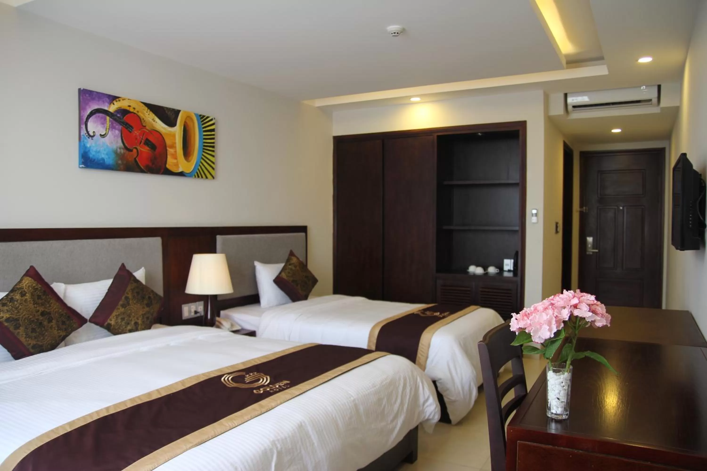 Bed in Golden Quang Tri Hotel