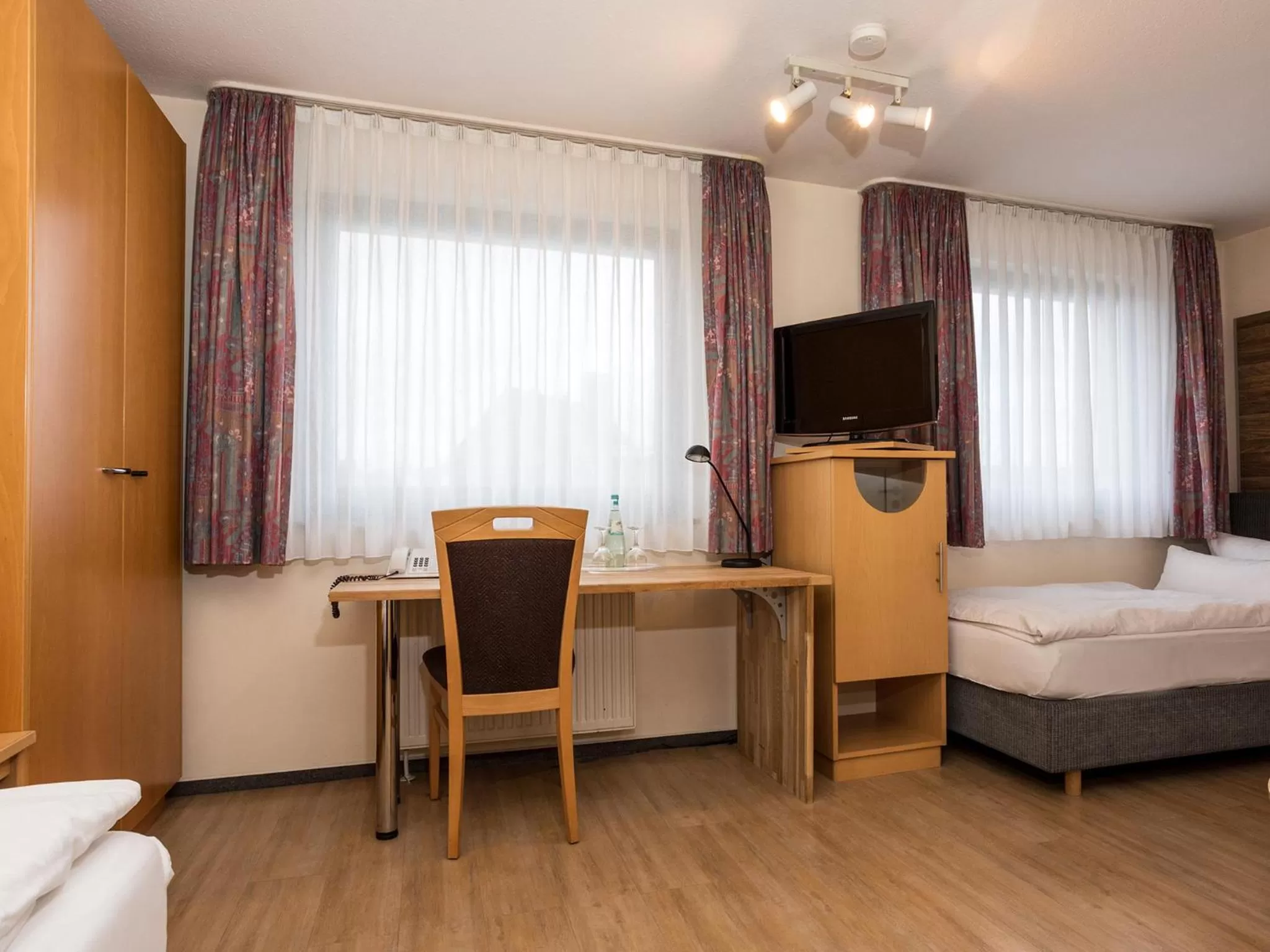 Photo of the whole room, Bed in Hotel & Wirtshaus Hansen