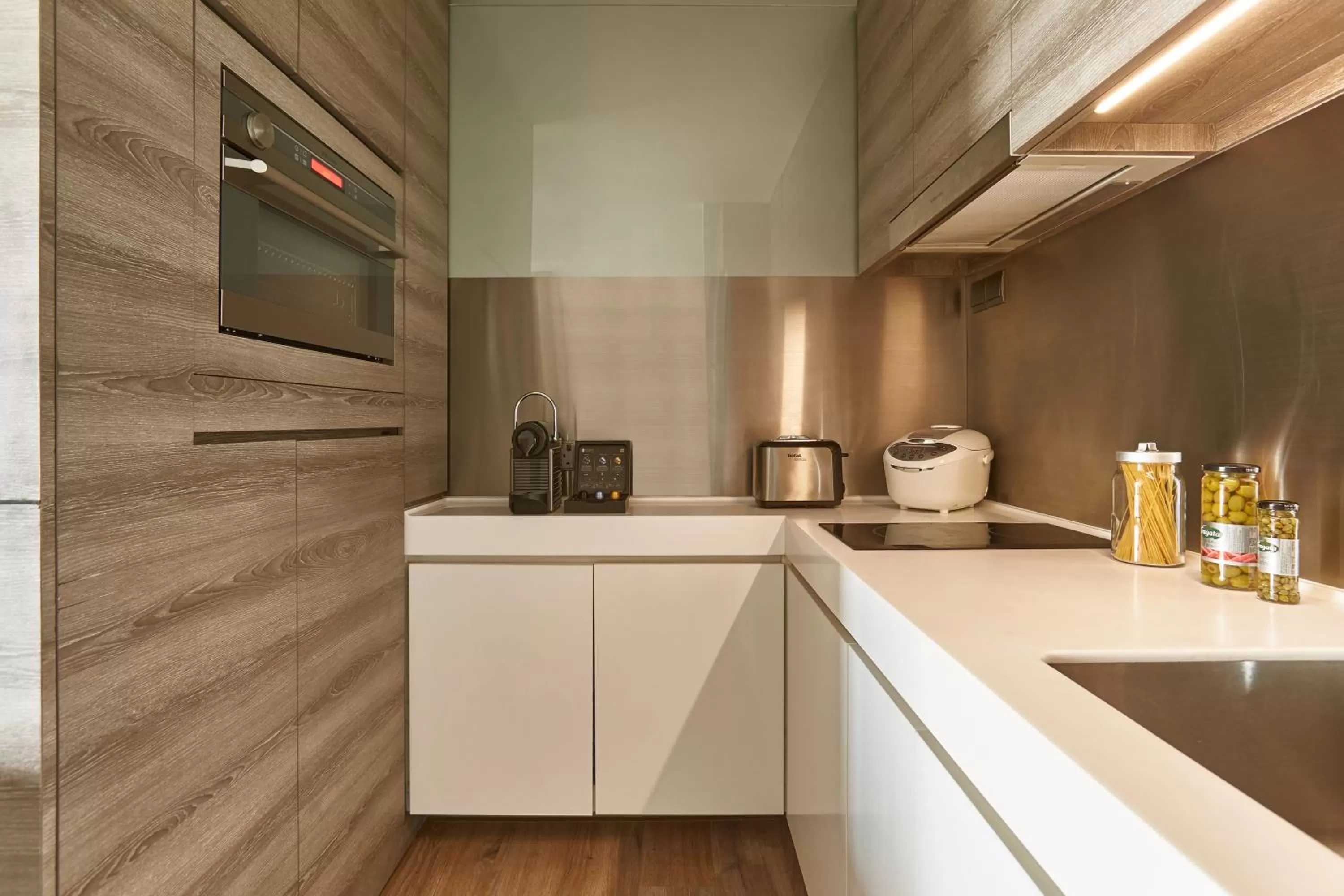 Kitchen or kitchenette in Pan Pacific Serviced Suites Beach Road, Singapore