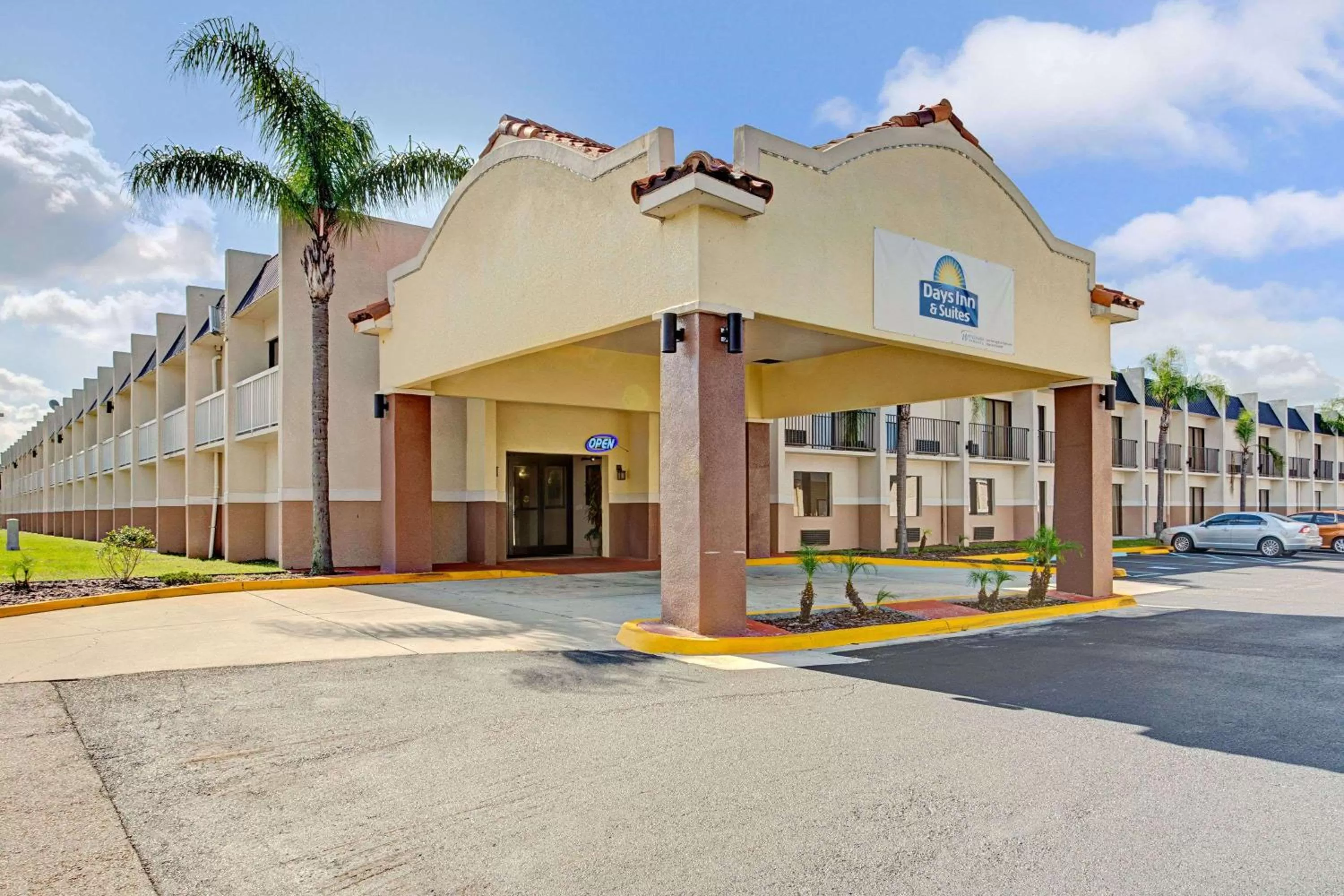 Property building in Days Inn & Suites by Wyndham Tampa - Ybor City