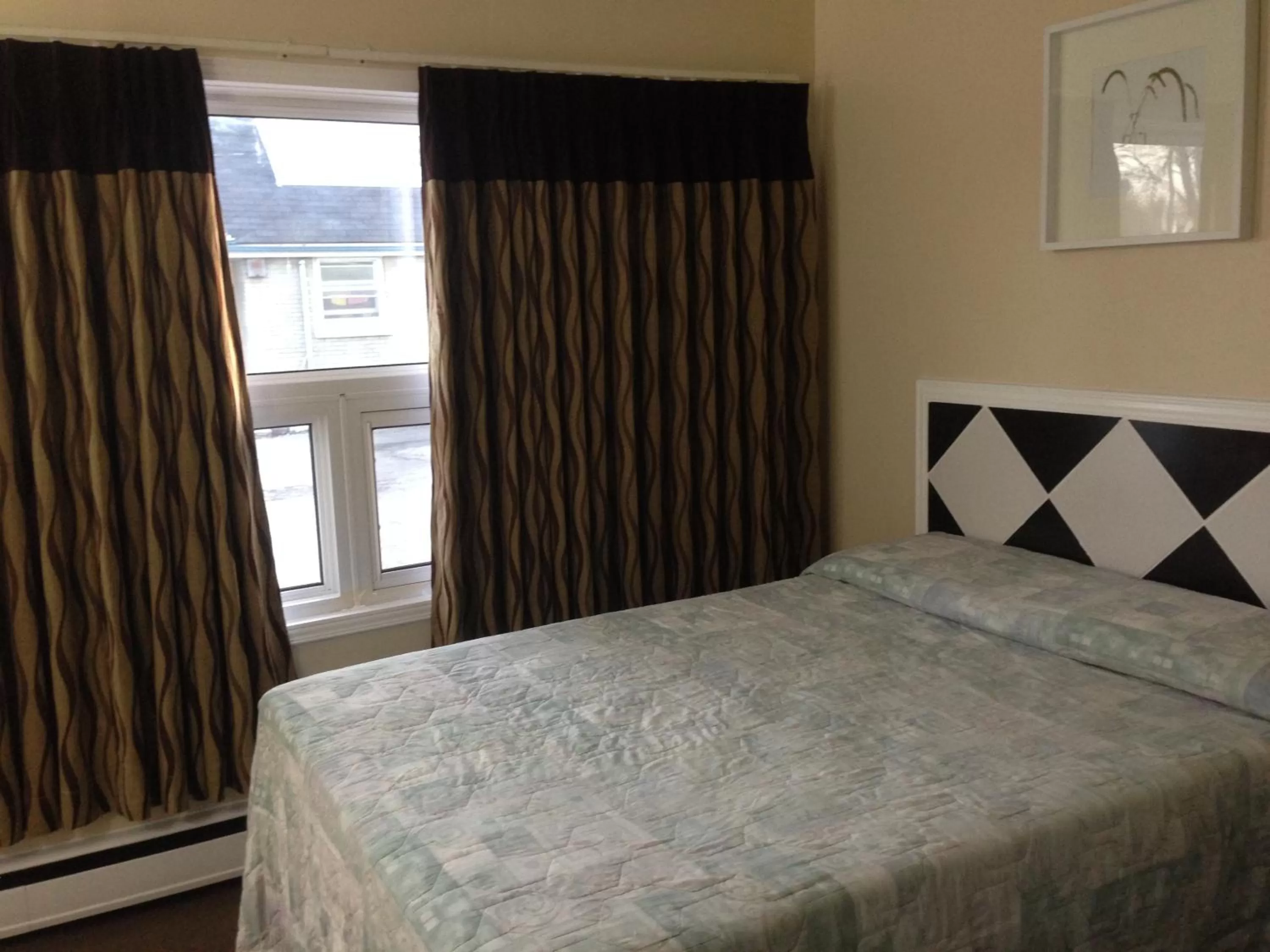 Bed in Davidson Motel