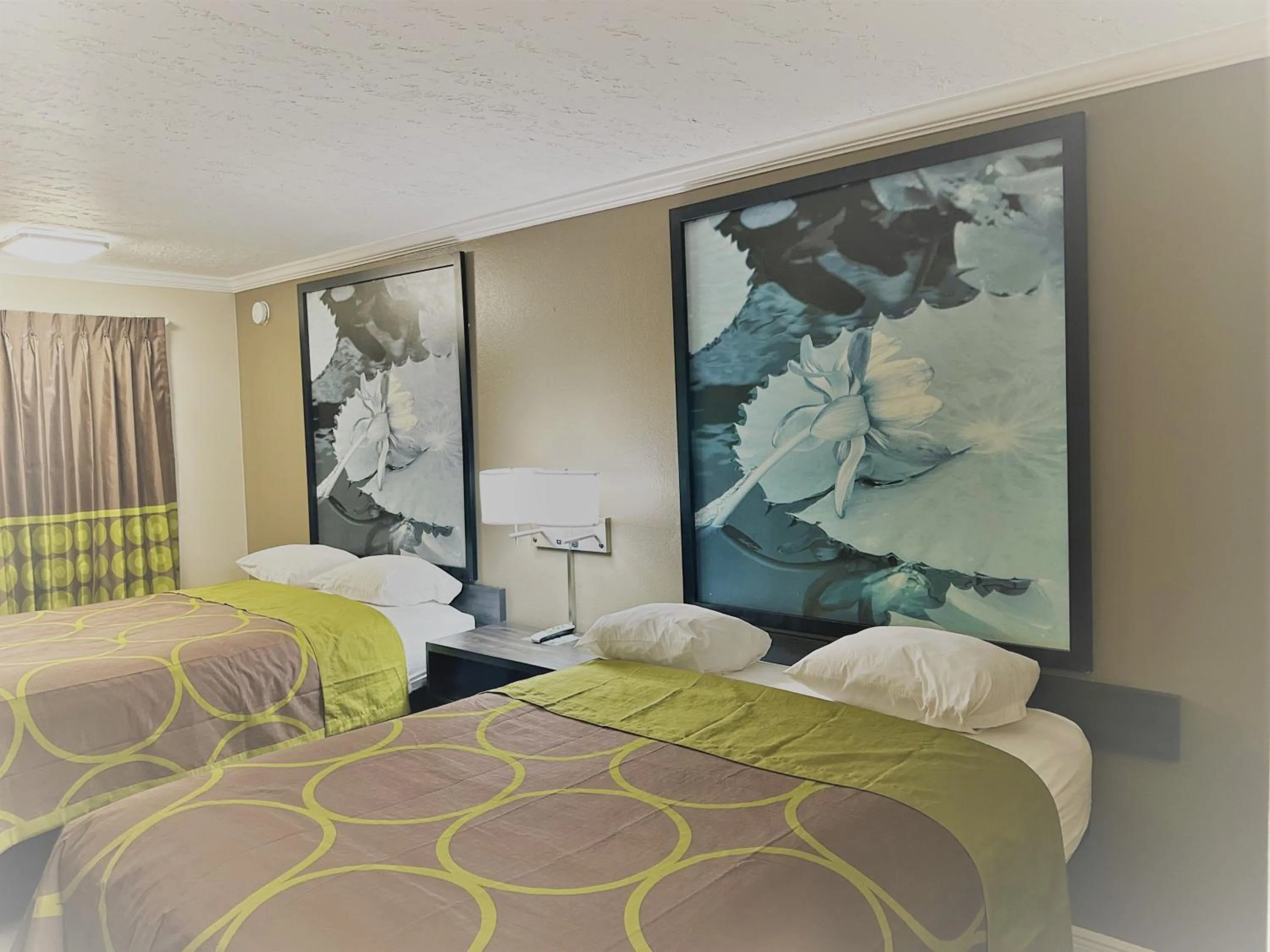 Bed in Super 8 by Wyndham Picayune