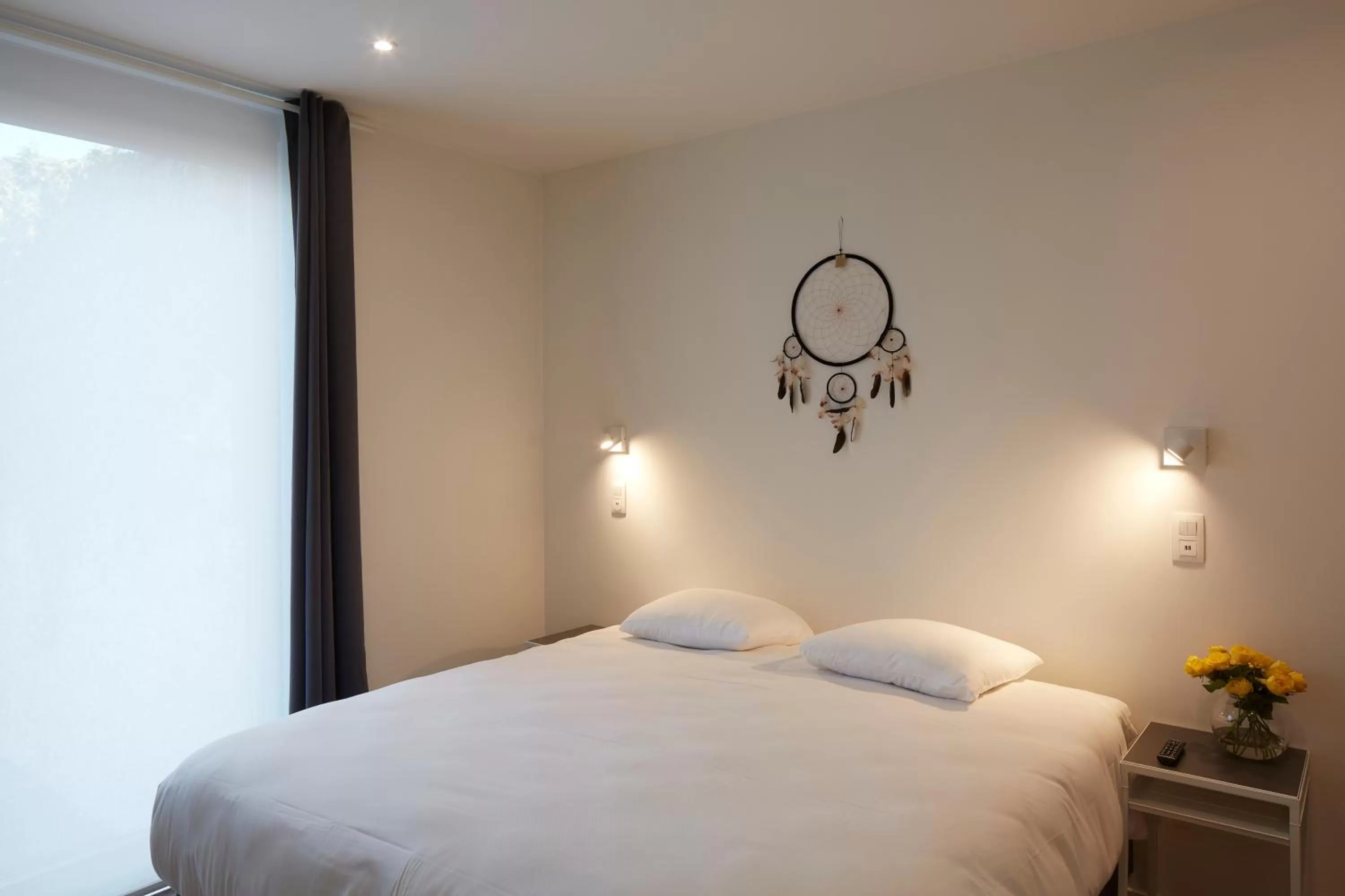 Bed in Alpha Hotel and Aparthotel