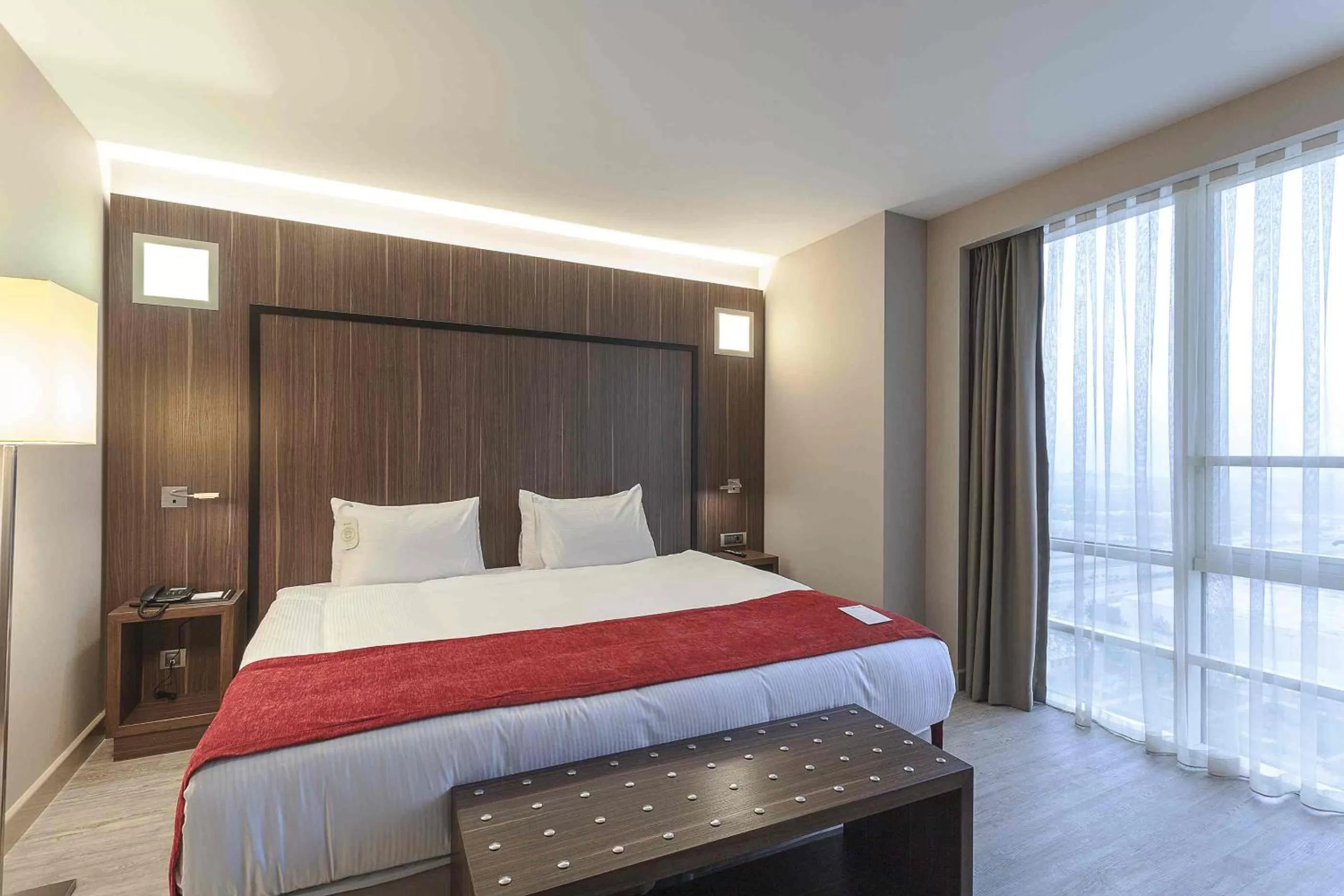 Bed in Ramada Encore by Wyndham Izmir