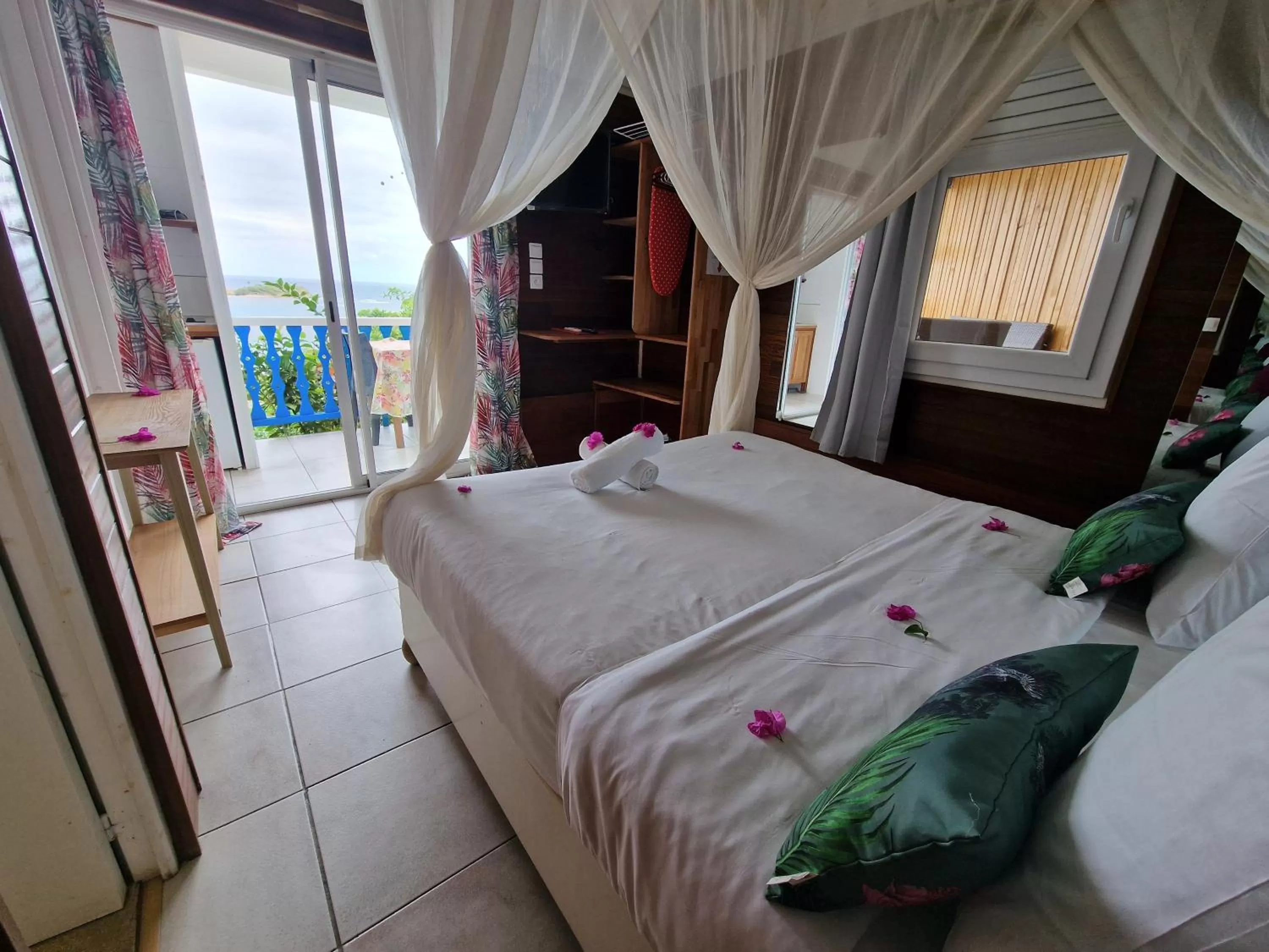 Bed in Hotel Le Manguier