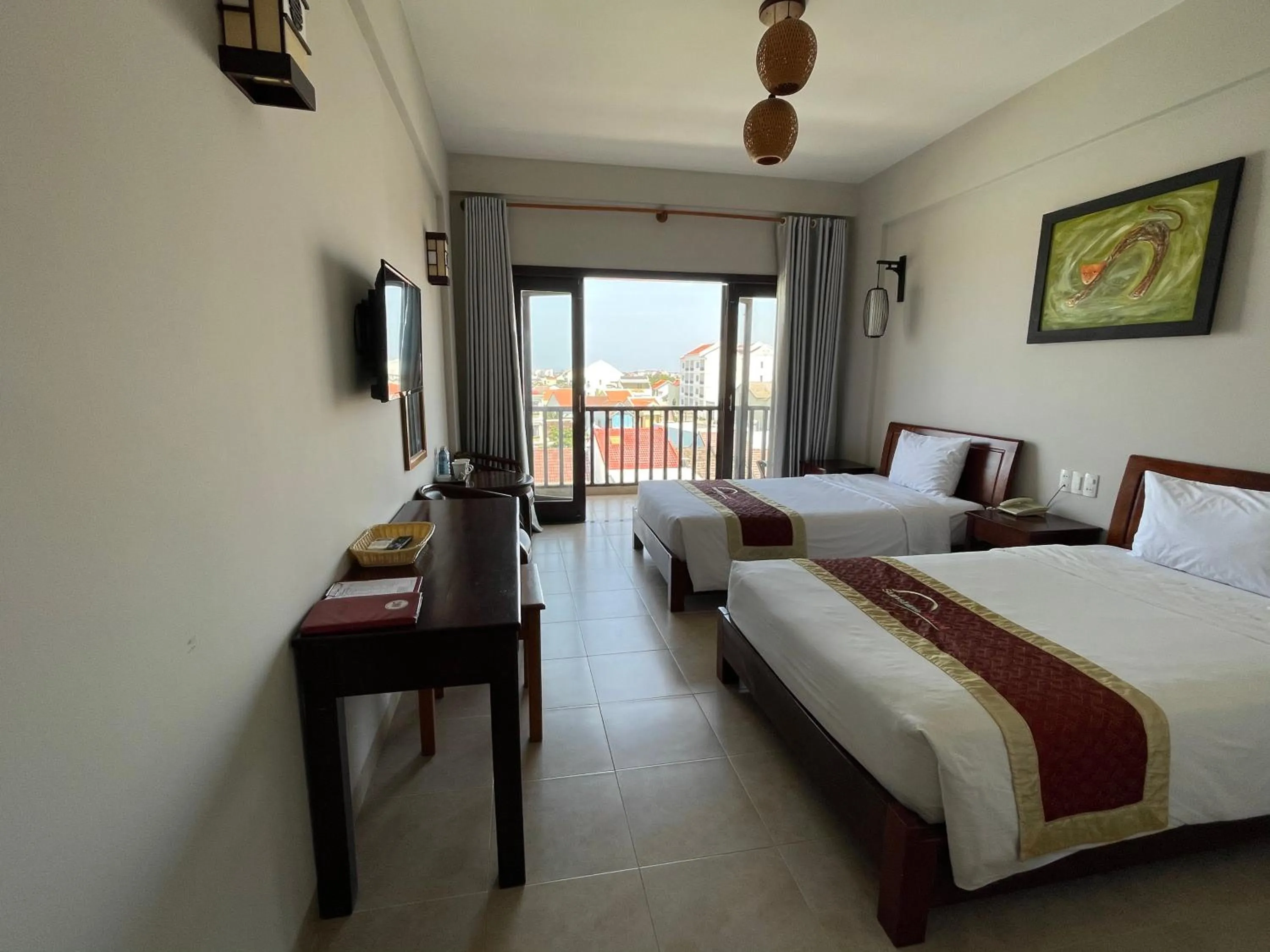 Bed in Sunshine Hoian Hotel