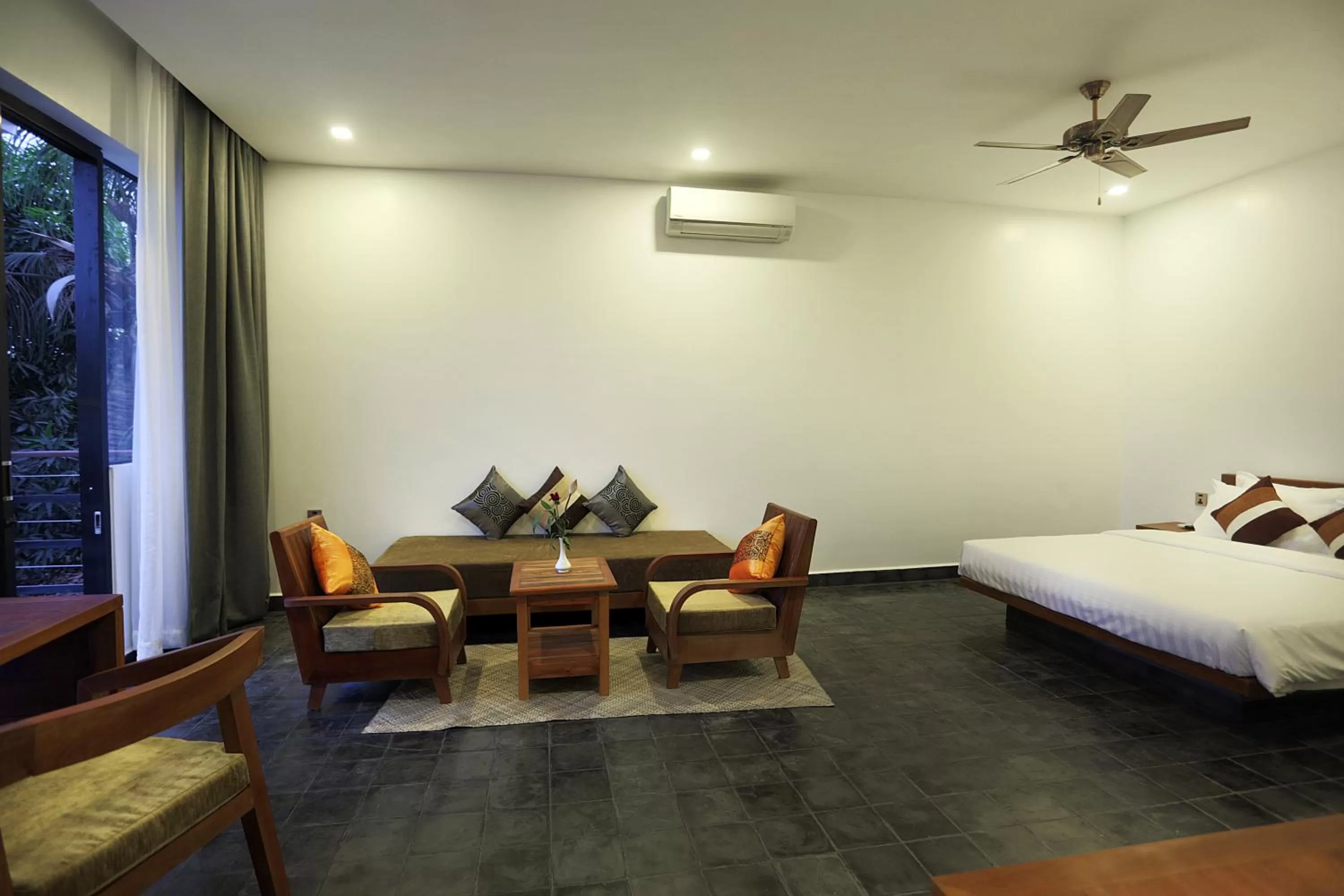 Seating area, Bed in Sam So Boutique Villa