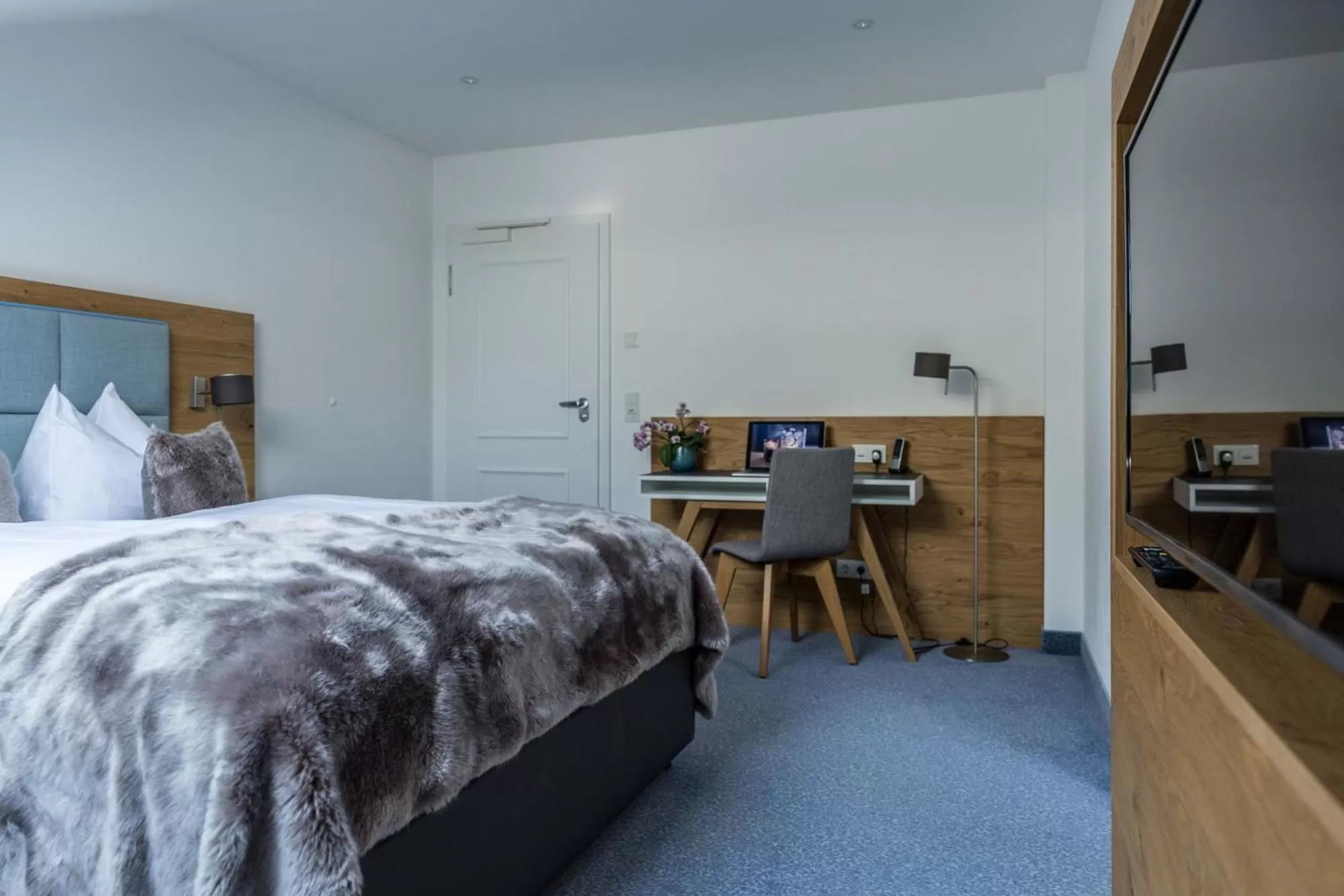 Living room, Bed in Das Aunhamer Suite & Spa Hotel