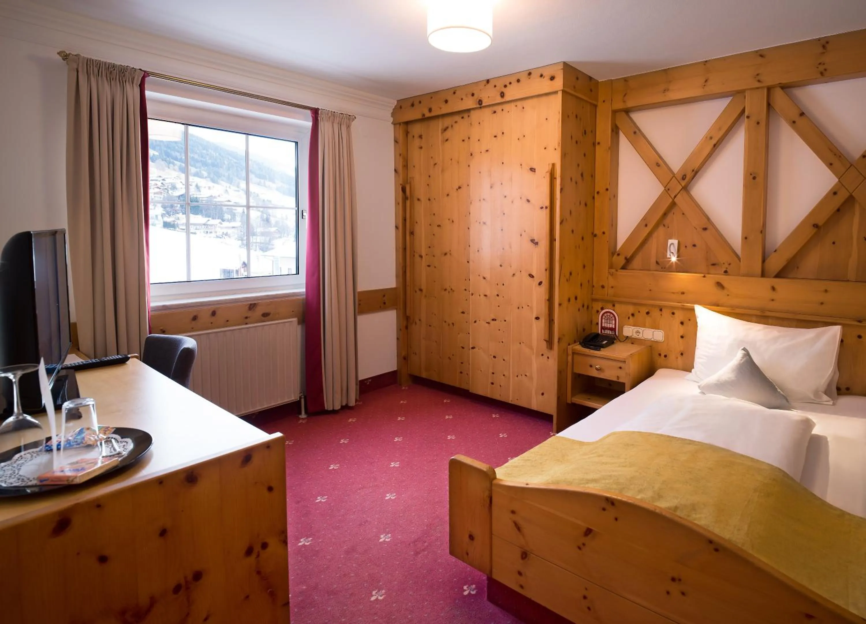 Photo of the whole room, Bed in JUFA Alpenhotel Saalbach