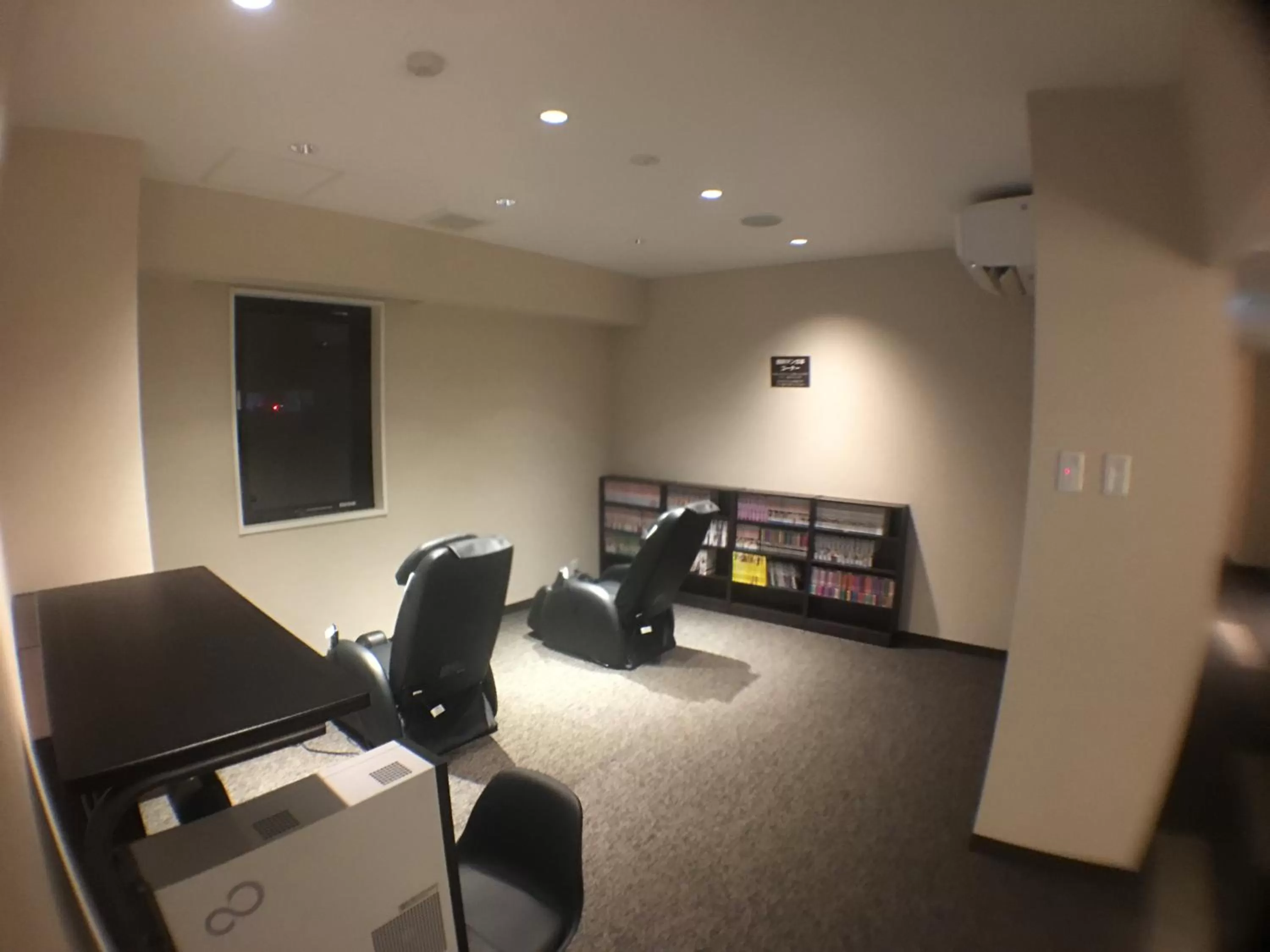 Communal lounge/ TV room in Hotel Crown Hills Onahama