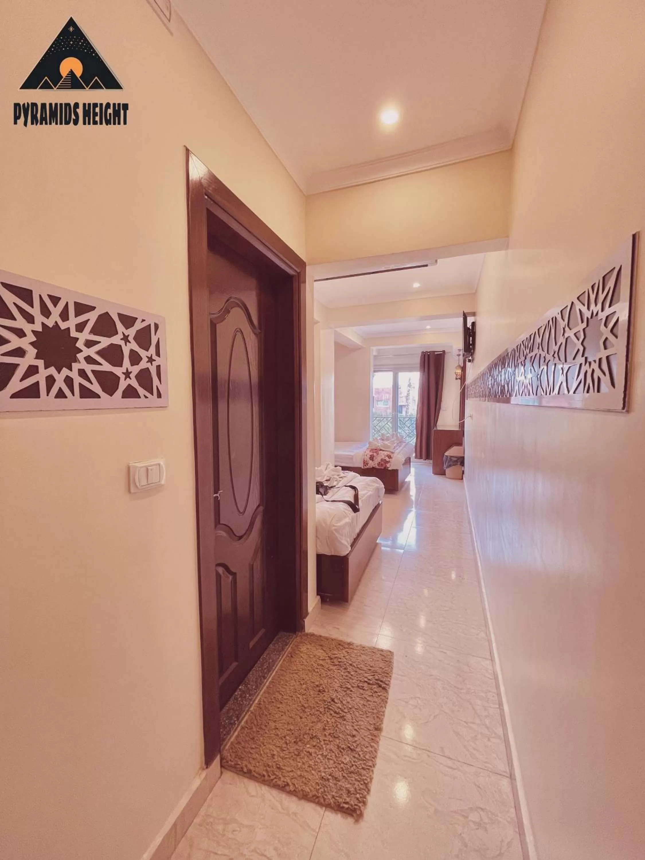 Bed in Pyramids Height Hotel & Pyramids Master Scene Rooftop