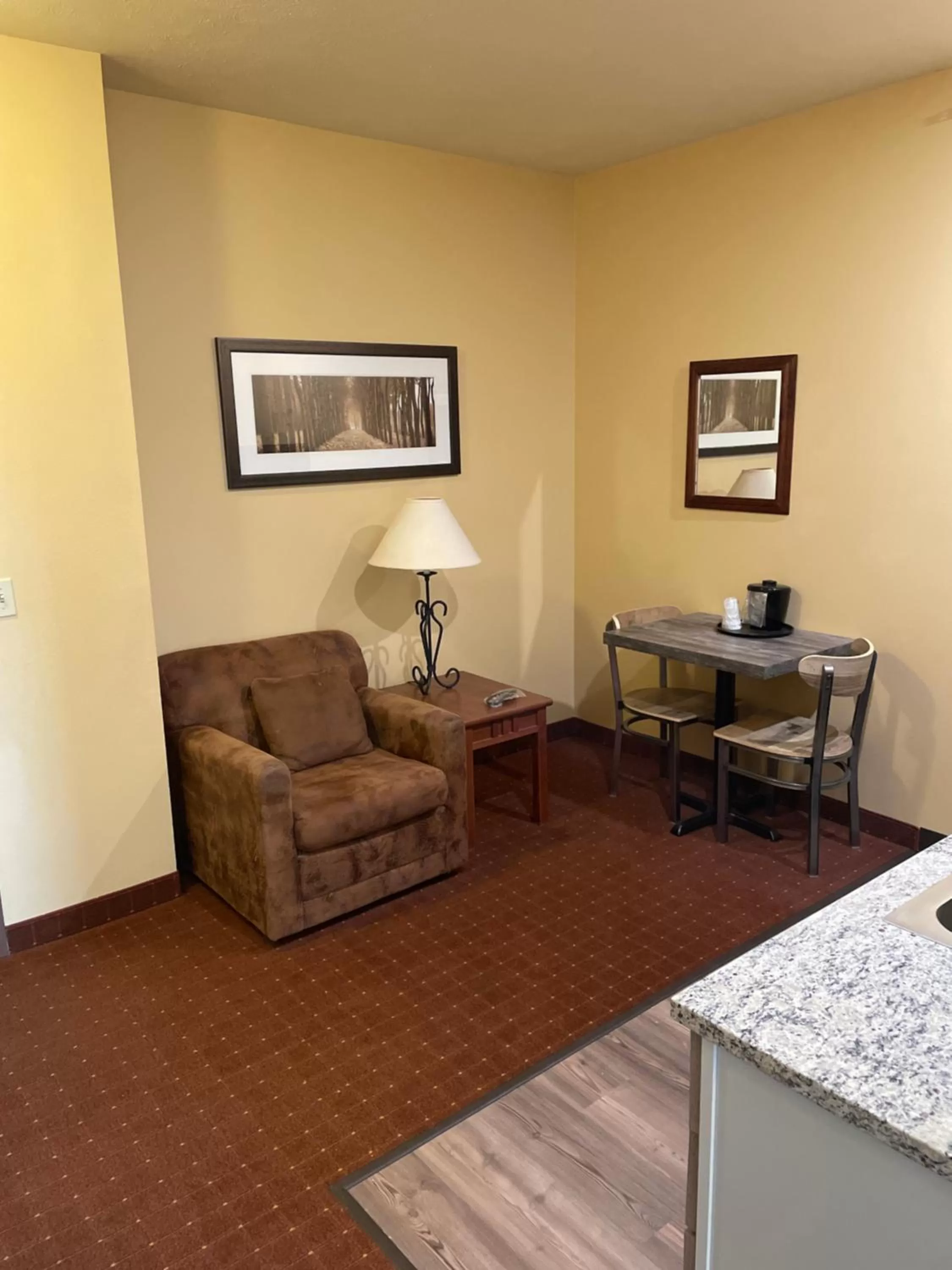 Living room in AmericInn by Wyndham Fargo Medical Center