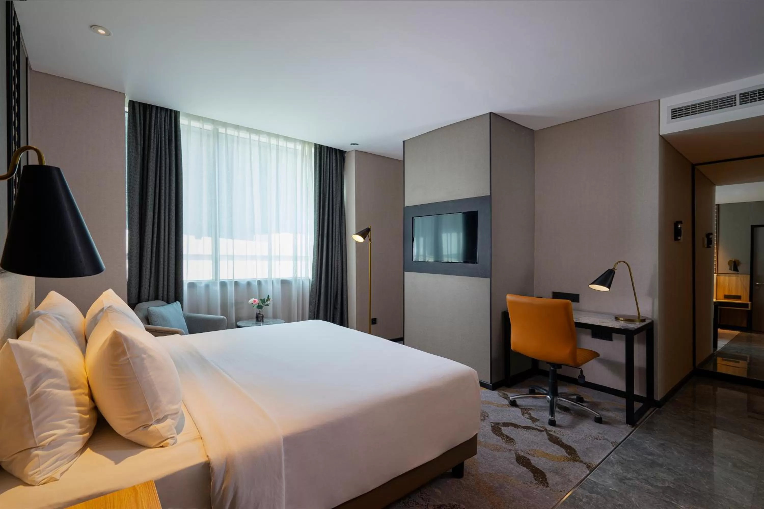 Bed in Anara Airport Hotel