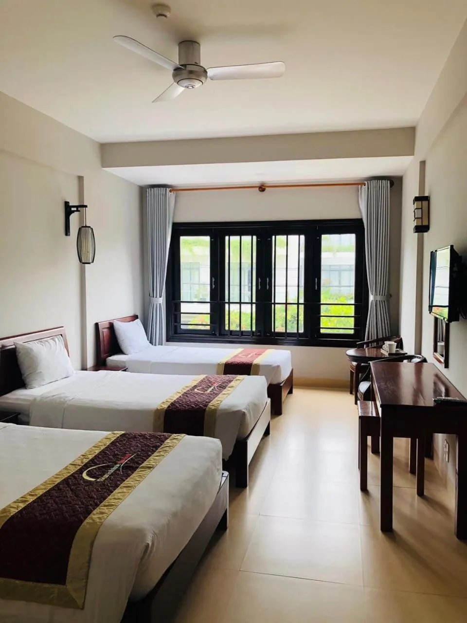 Bed in Sunshine Hoian Hotel