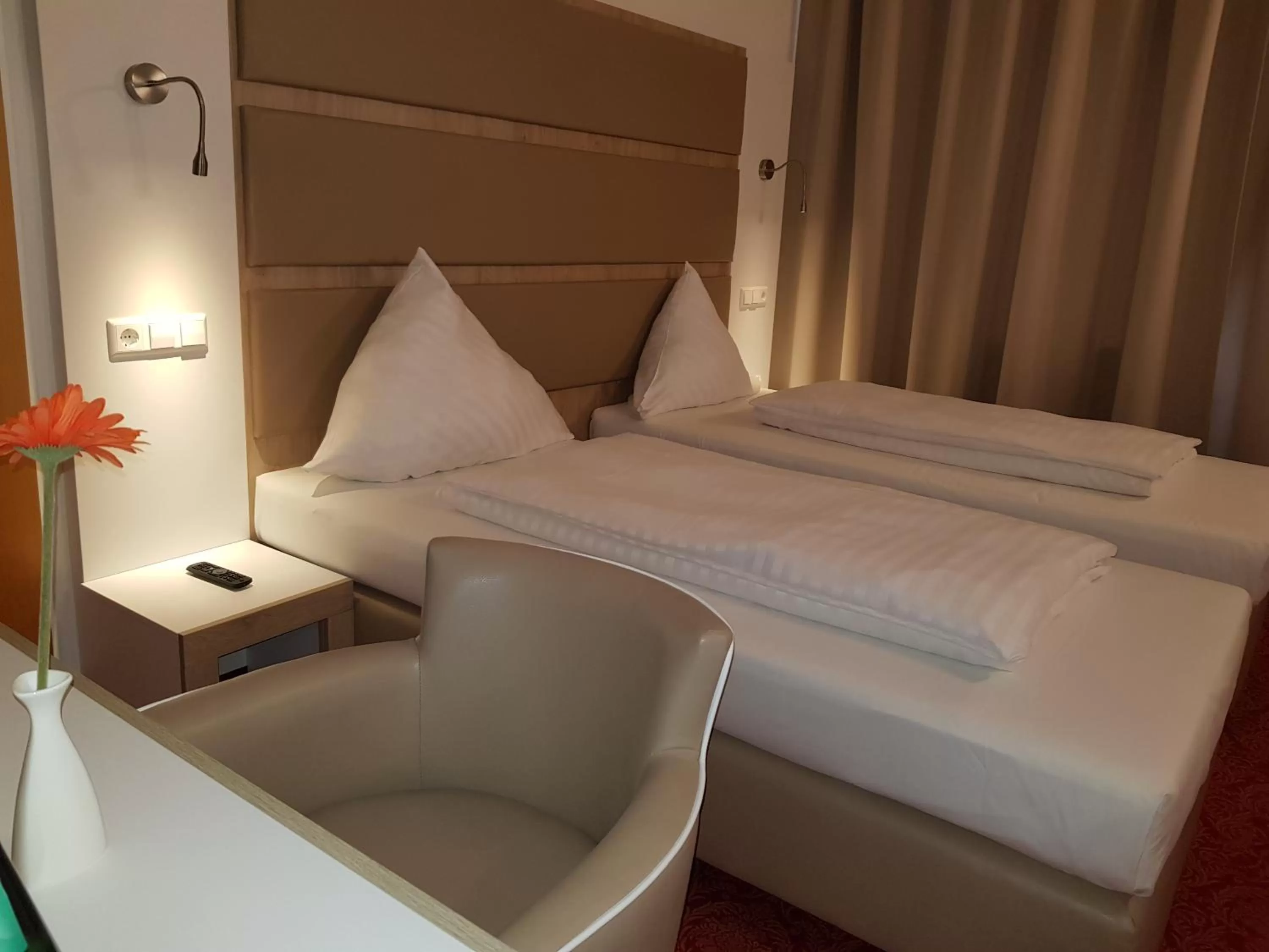 Bed in Confour Hotel