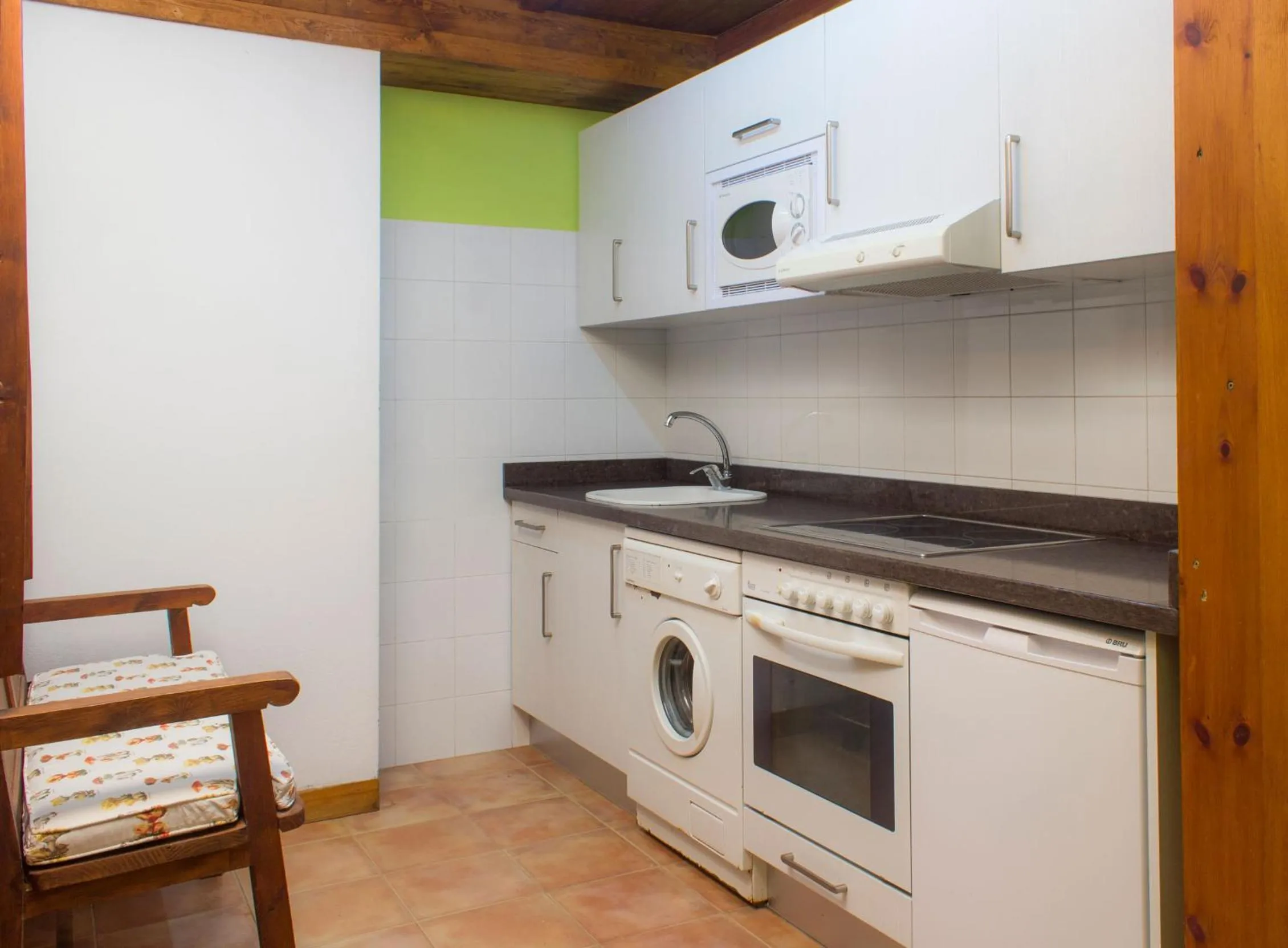 Kitchen or kitchenette in Viviendas Rurales El Covaju