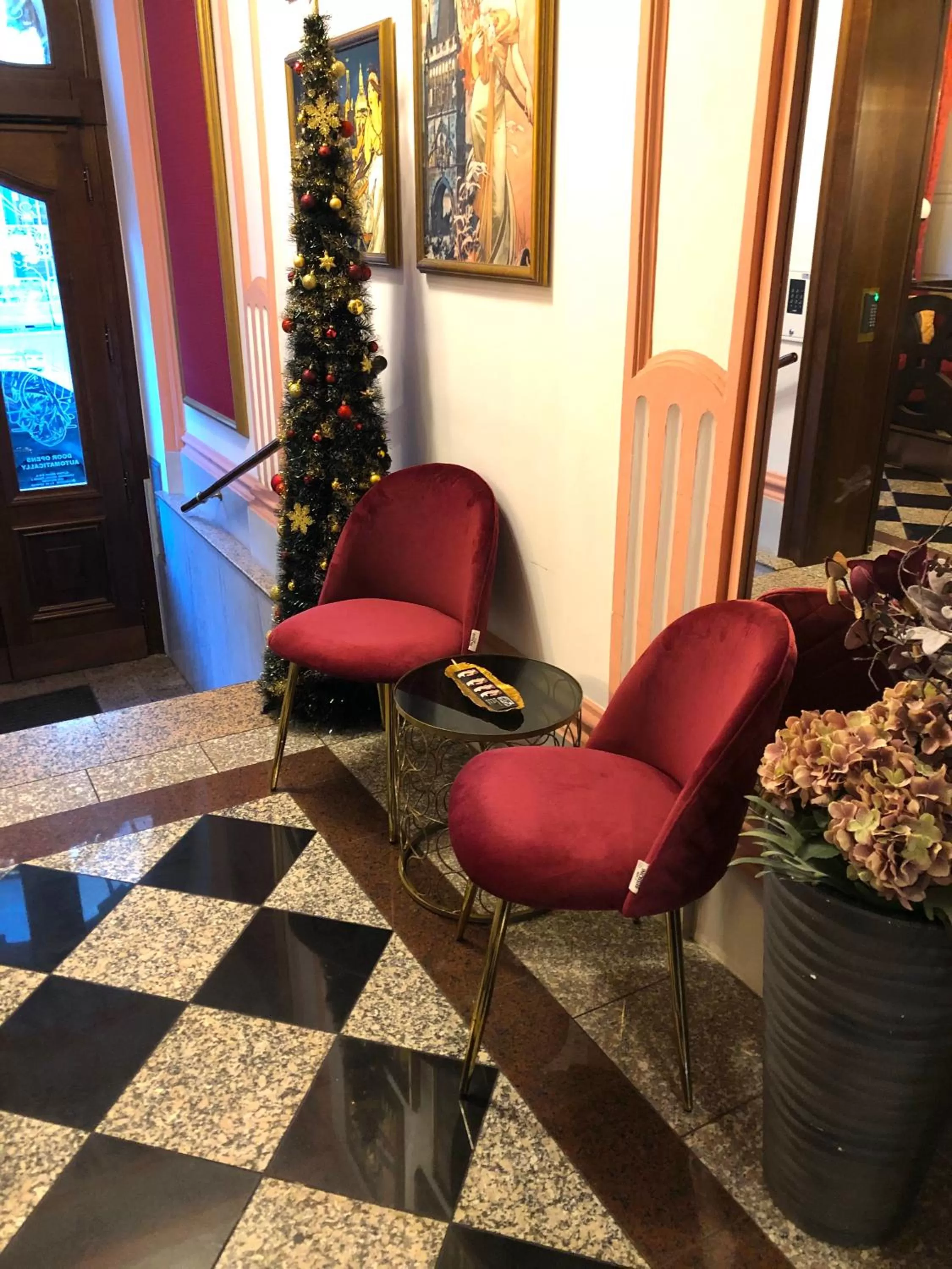 Lobby or reception in Alfons Boutique Hotel