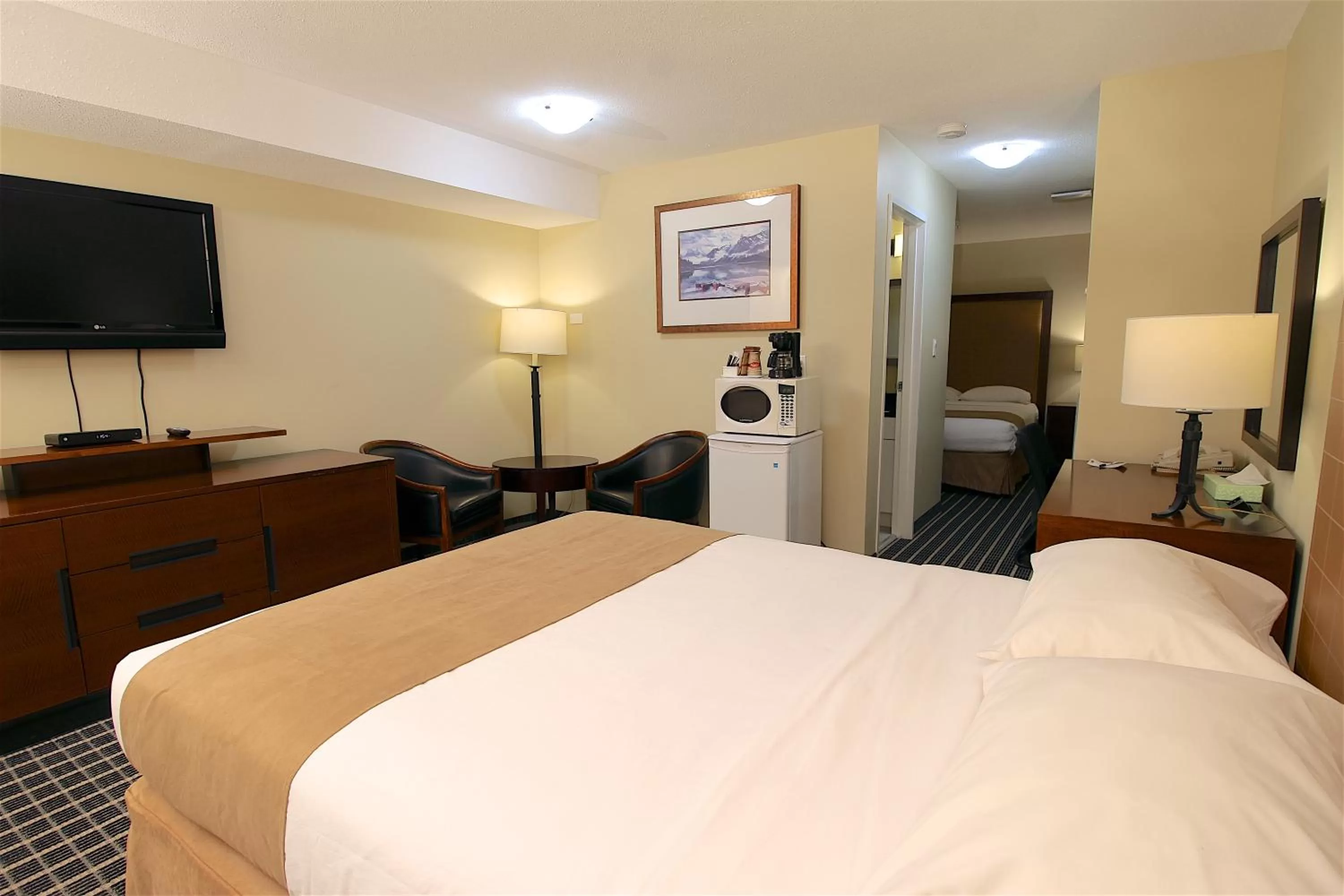 Bed in Medicine Hat Suites