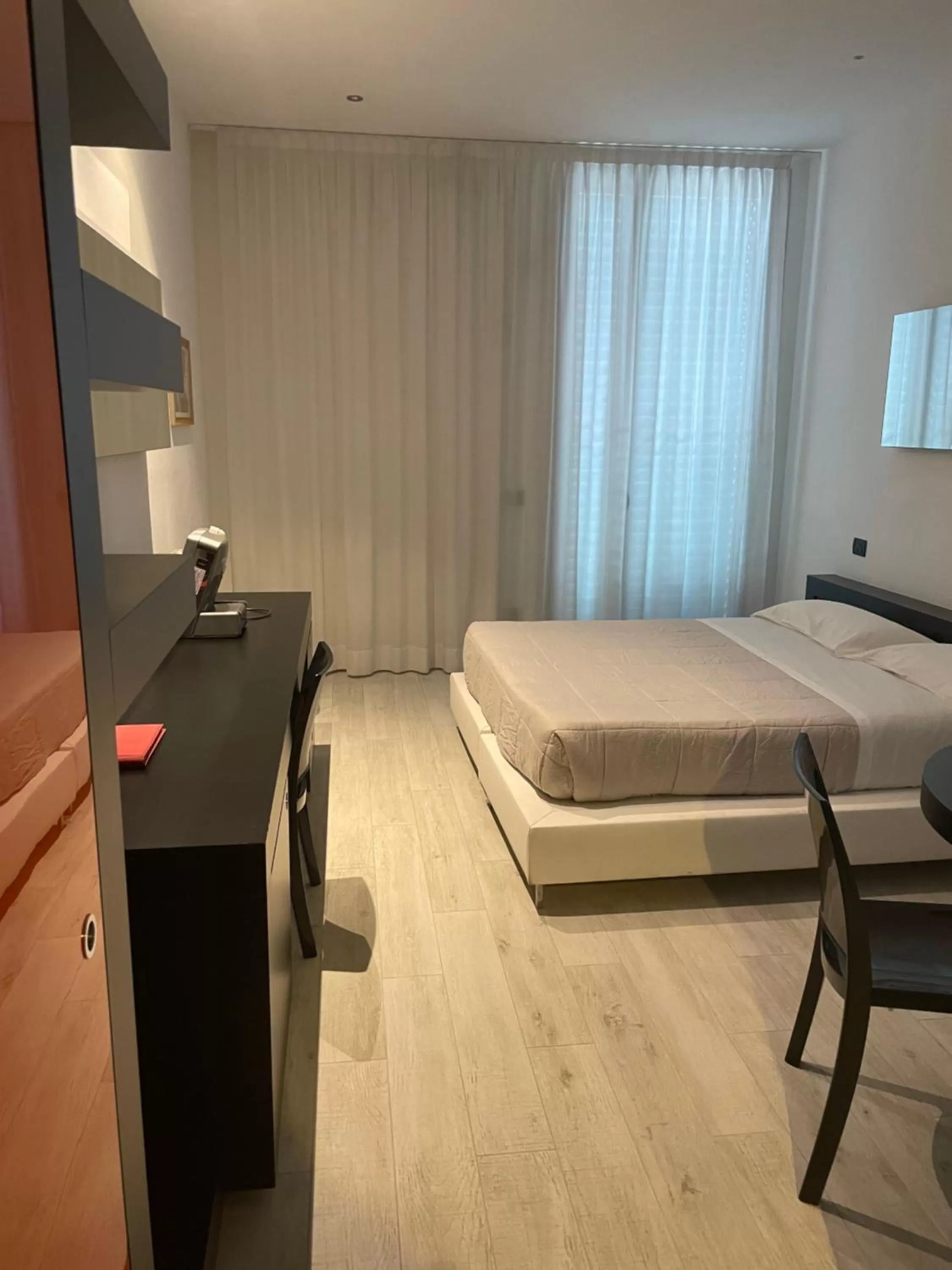 Bed in Blue Shades Hotel