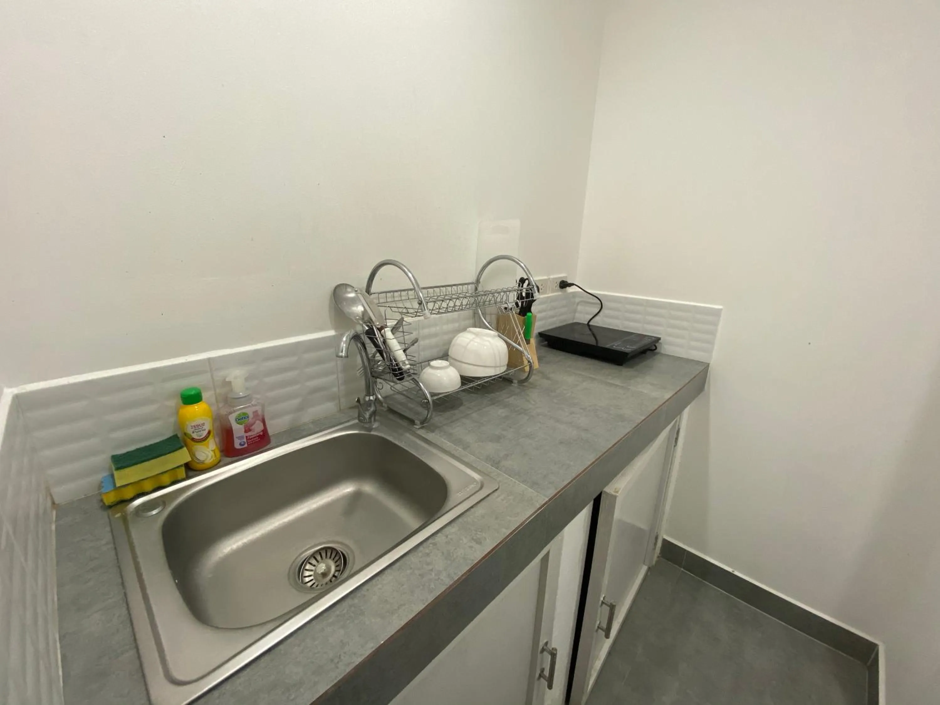 Kitchen or kitchenette in Colorize Boutique Hotel