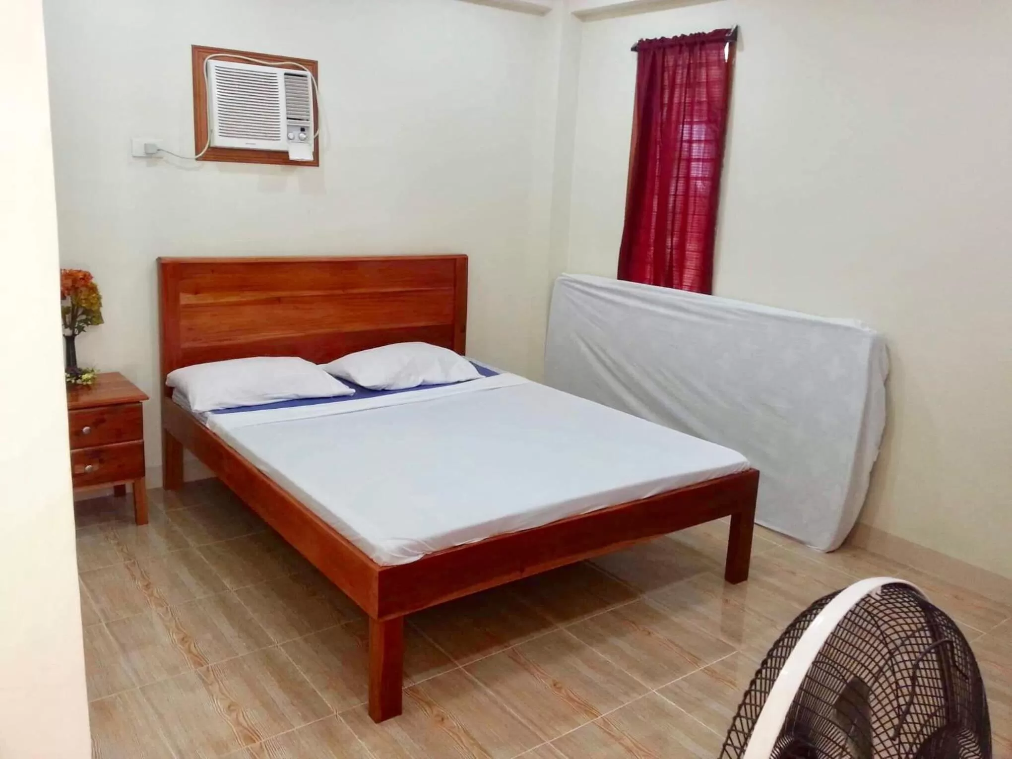 Bed in D's Oceanview Beach Resort